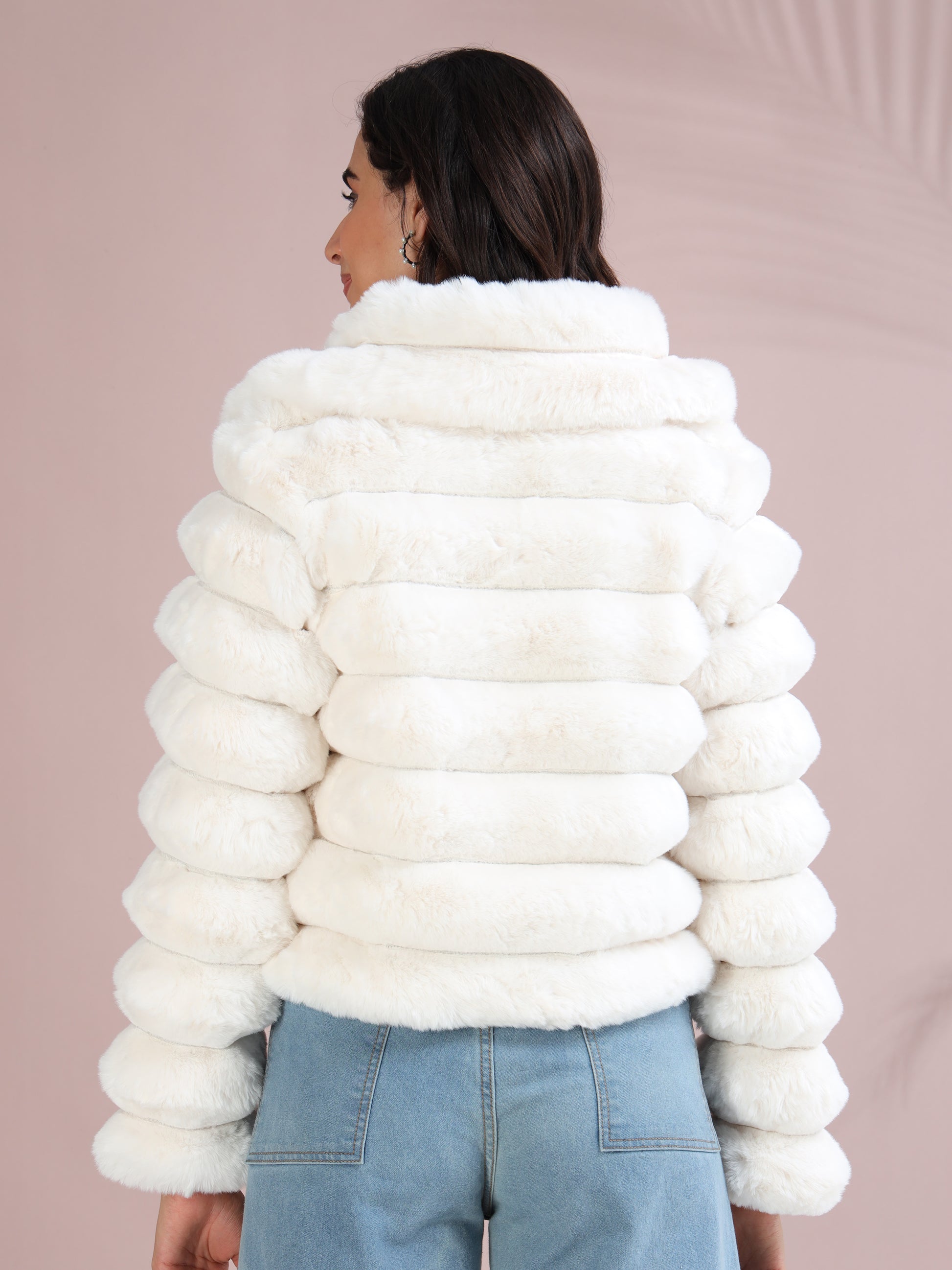 white faux fur puffer jacket showing quilted design