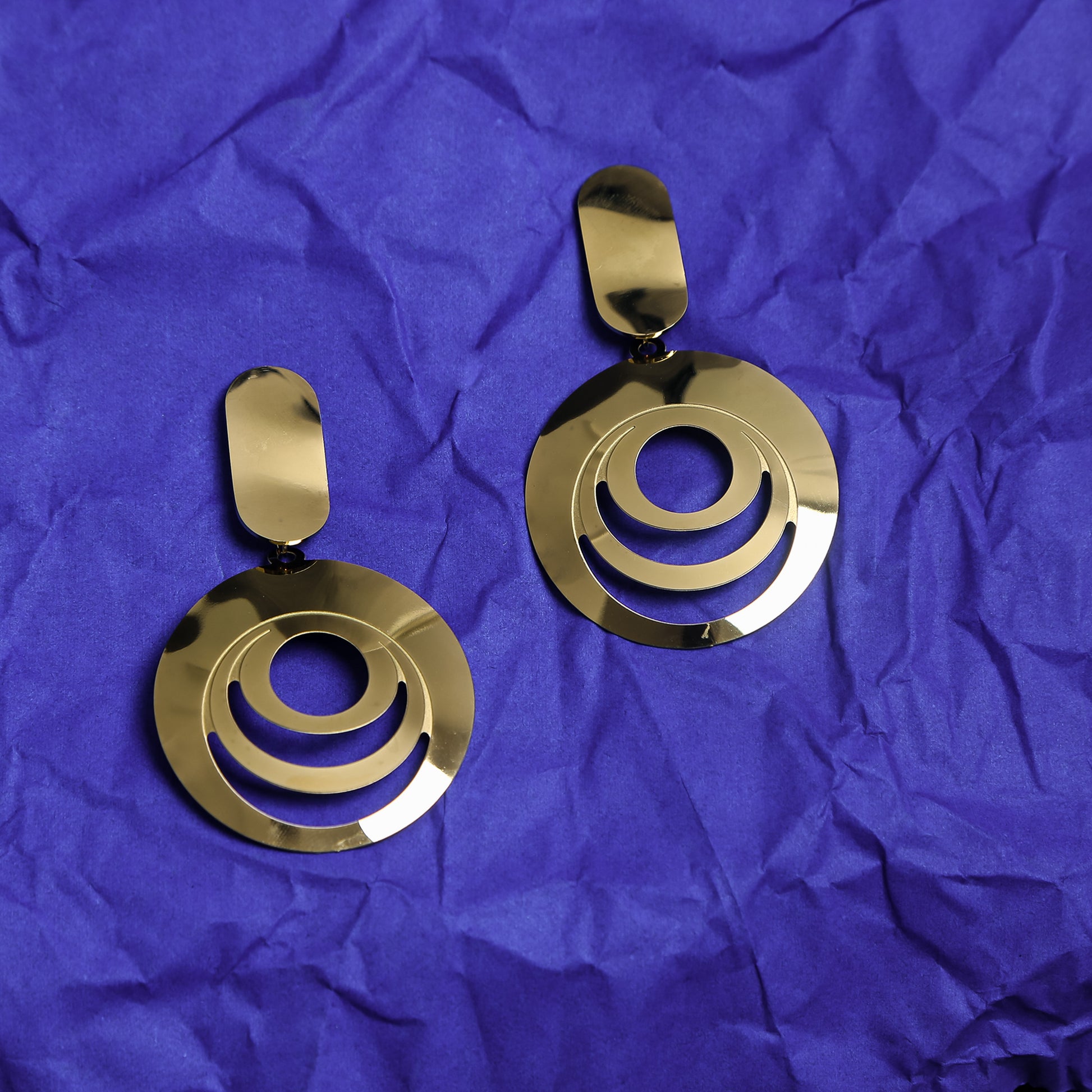 Gold geometric circle drop earrings with layered cut-out design
