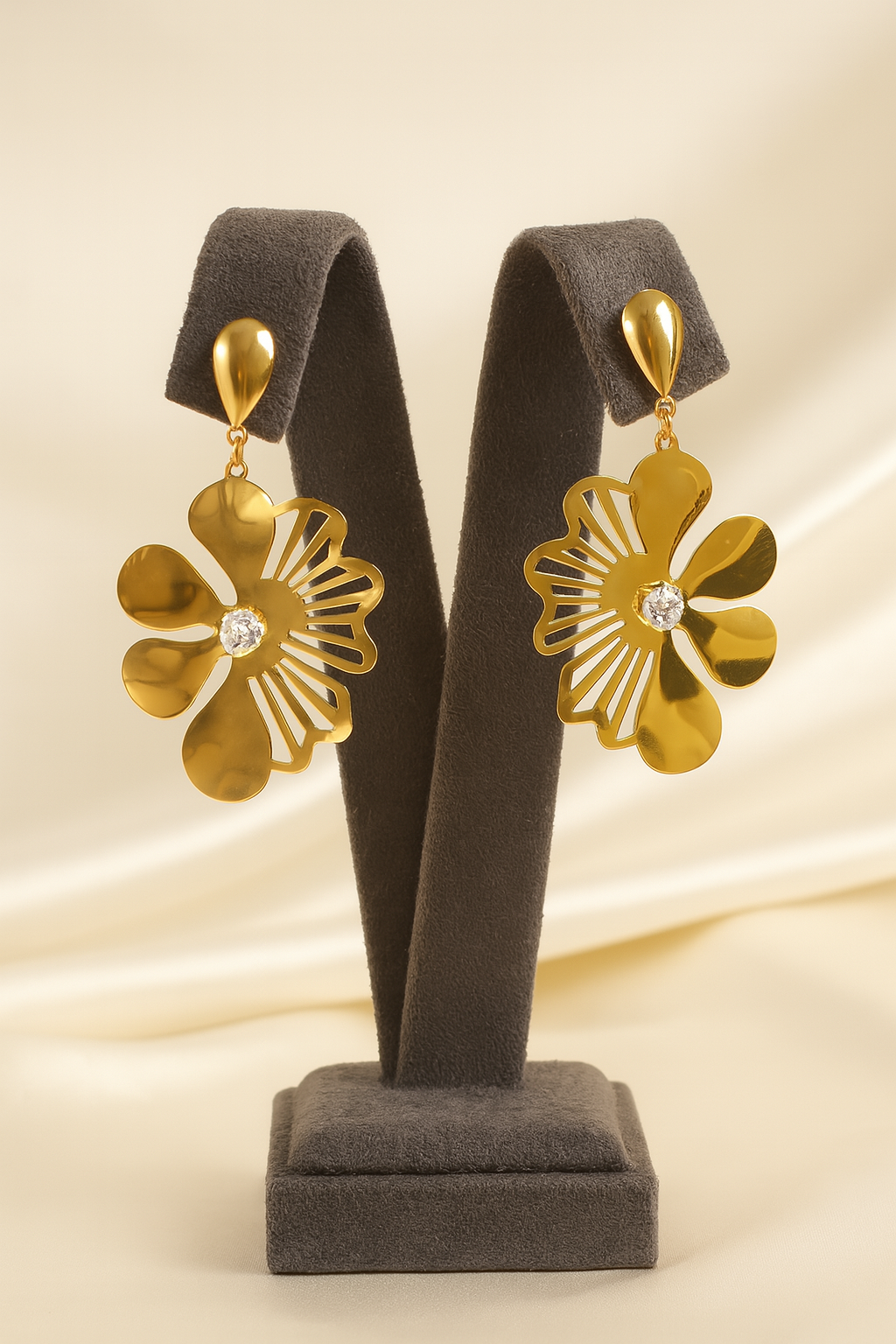 Elegant gold plated floral statement earrings with sparkling crystal centerpiece