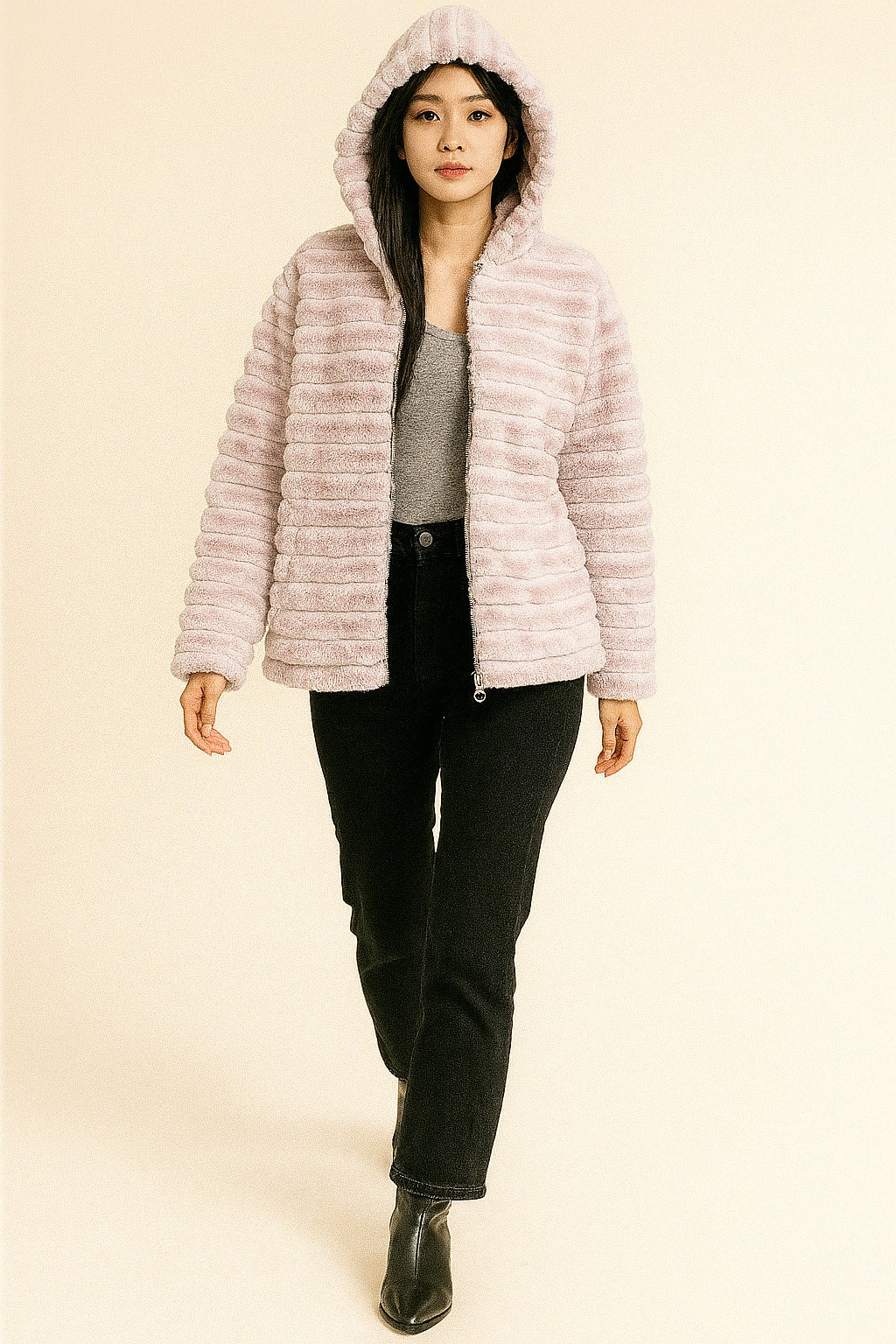 pink faux fur winter jacket, hood on, soft velvet-like texture, stylish cozy outerwear.