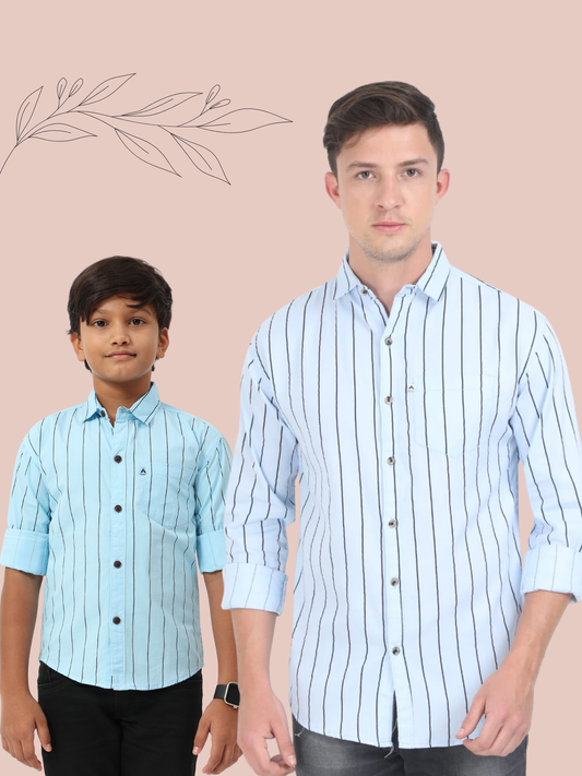 Two individuals wearing light blue striped shirts against a beige background