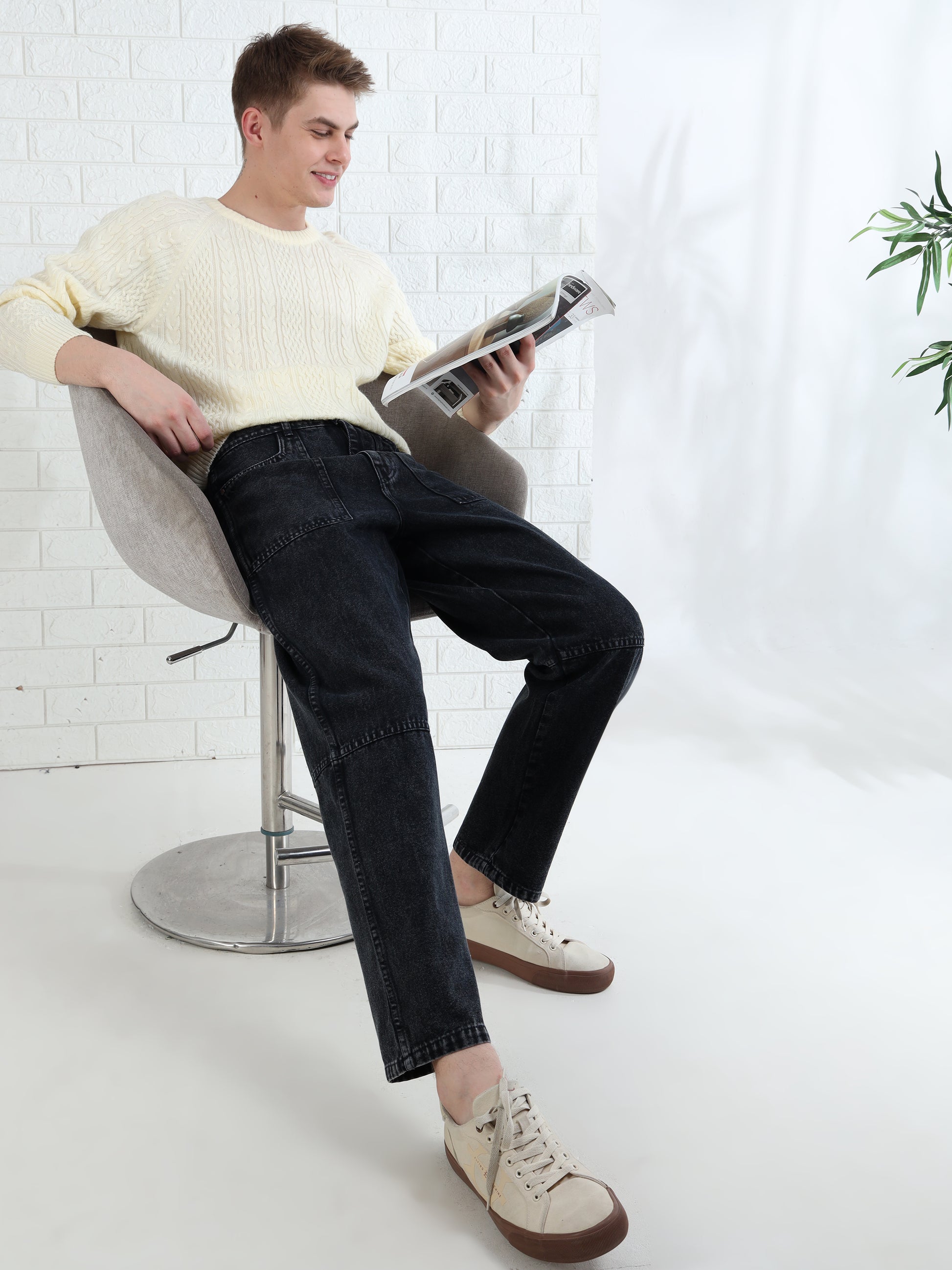 Trendy men's black denim pants with classic five pocket design
