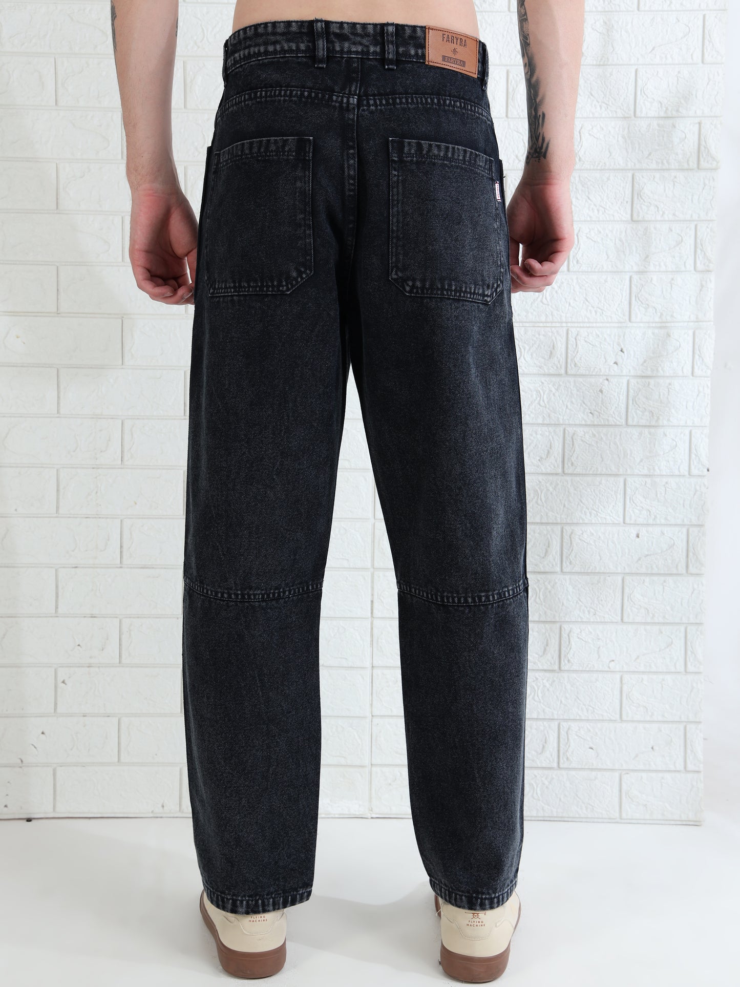 Fashionable men's straight leg jeans with subtle fade and durable fabric