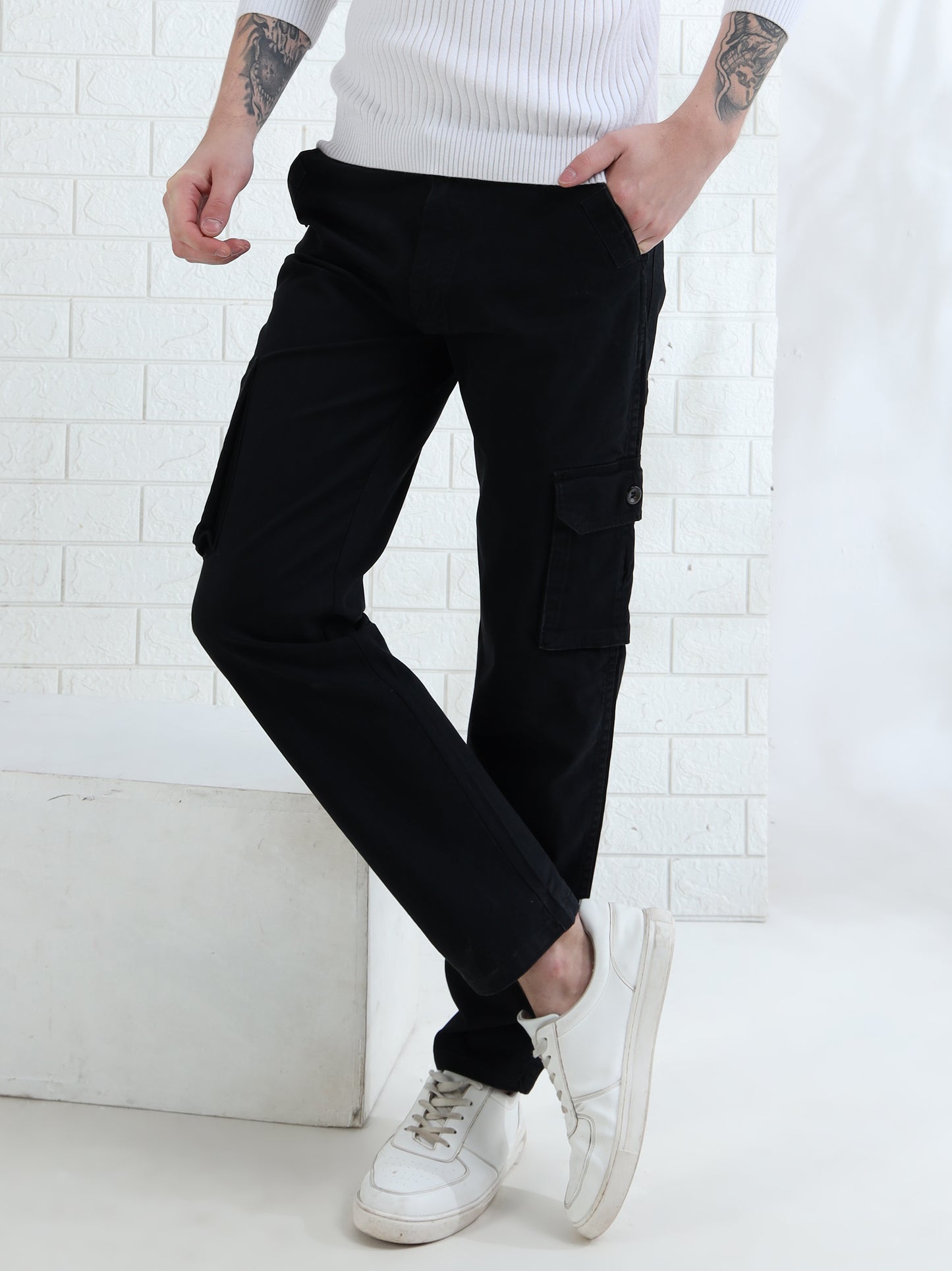 Mens black cotton cargo pants with side pockets and straight fit design