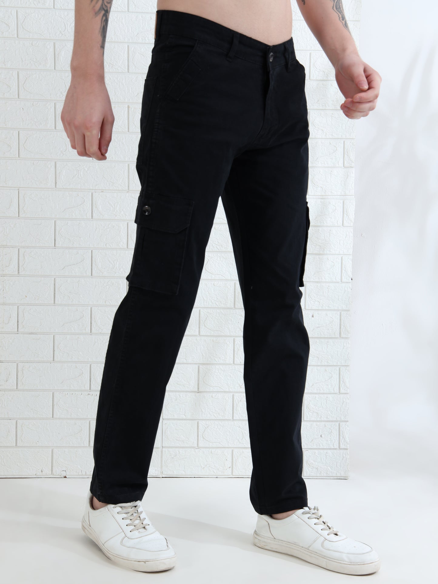 Stylish men's black cargo trousers with utility pockets and comfortable fit