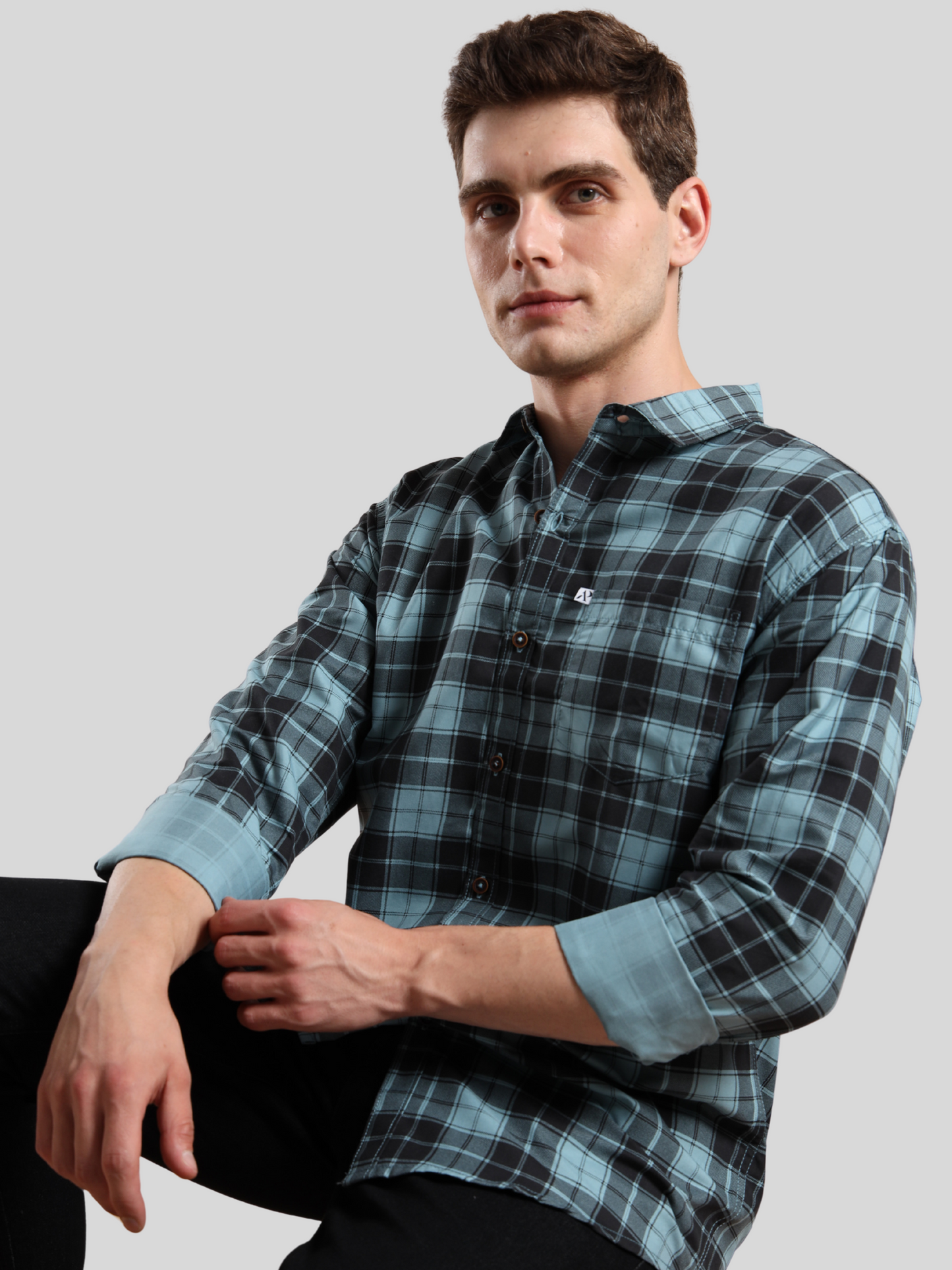 Classic aqua blue plaid shirt for men with button-down style and front pocket
