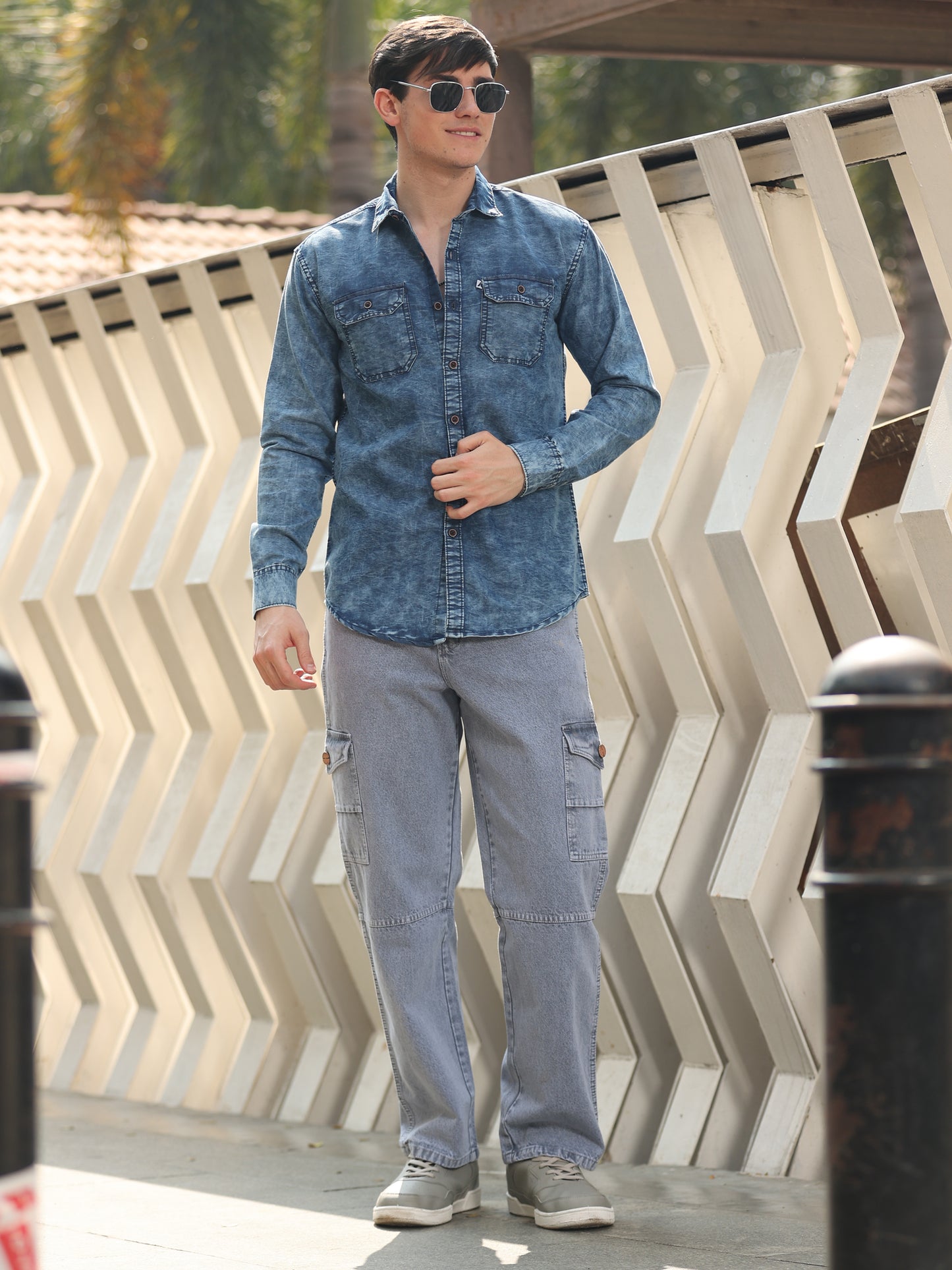 Men, casual denim shirt outfit with blue washed shirt and grey straight-fit cargo pants.