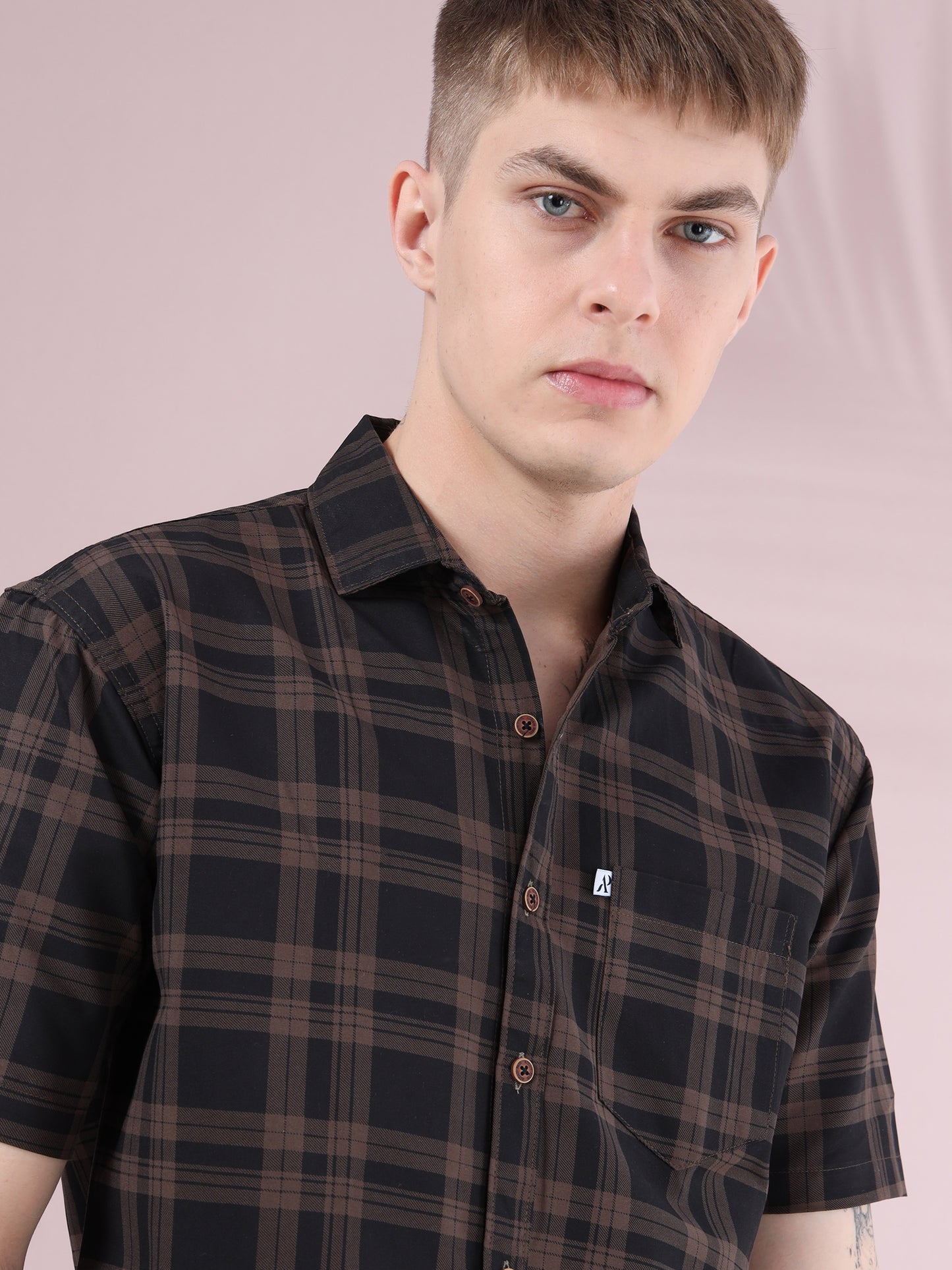 men, brown and black checkered shirt with button-down front and chest pocket.