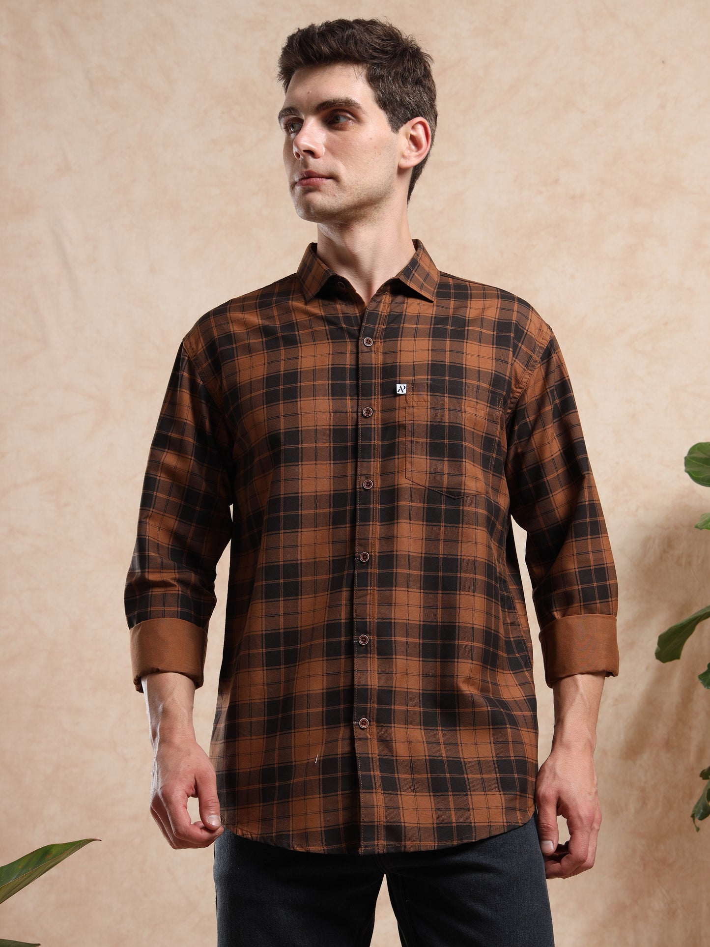 Mens brown and black checked cotton shirt with full sleeves, styled with sunglasses