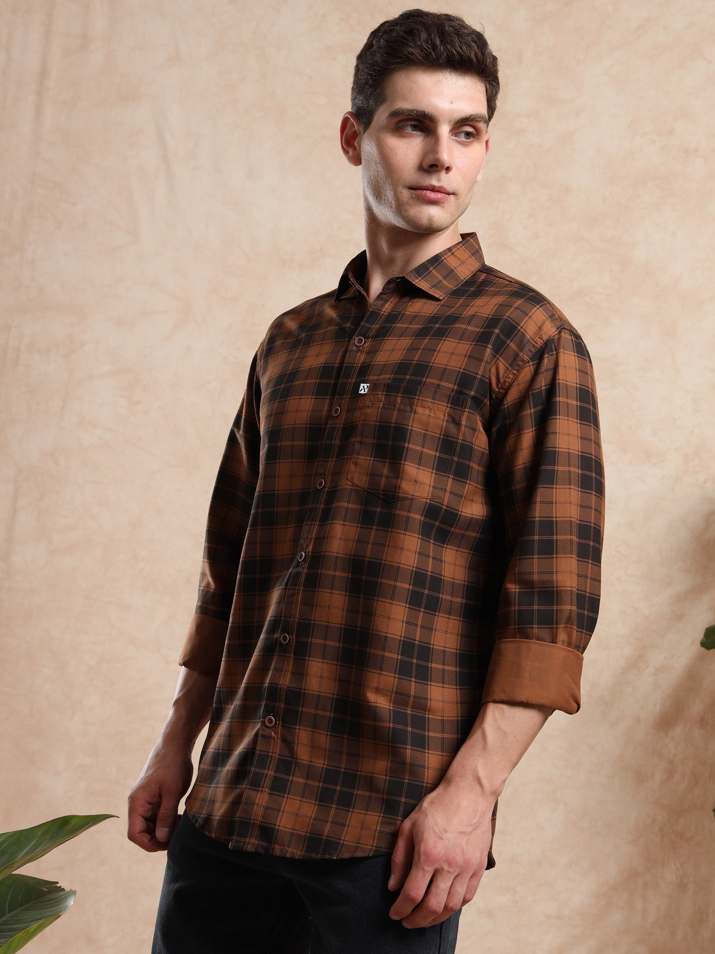 men, brown checked shirt with rolled sleeves and smart casual look