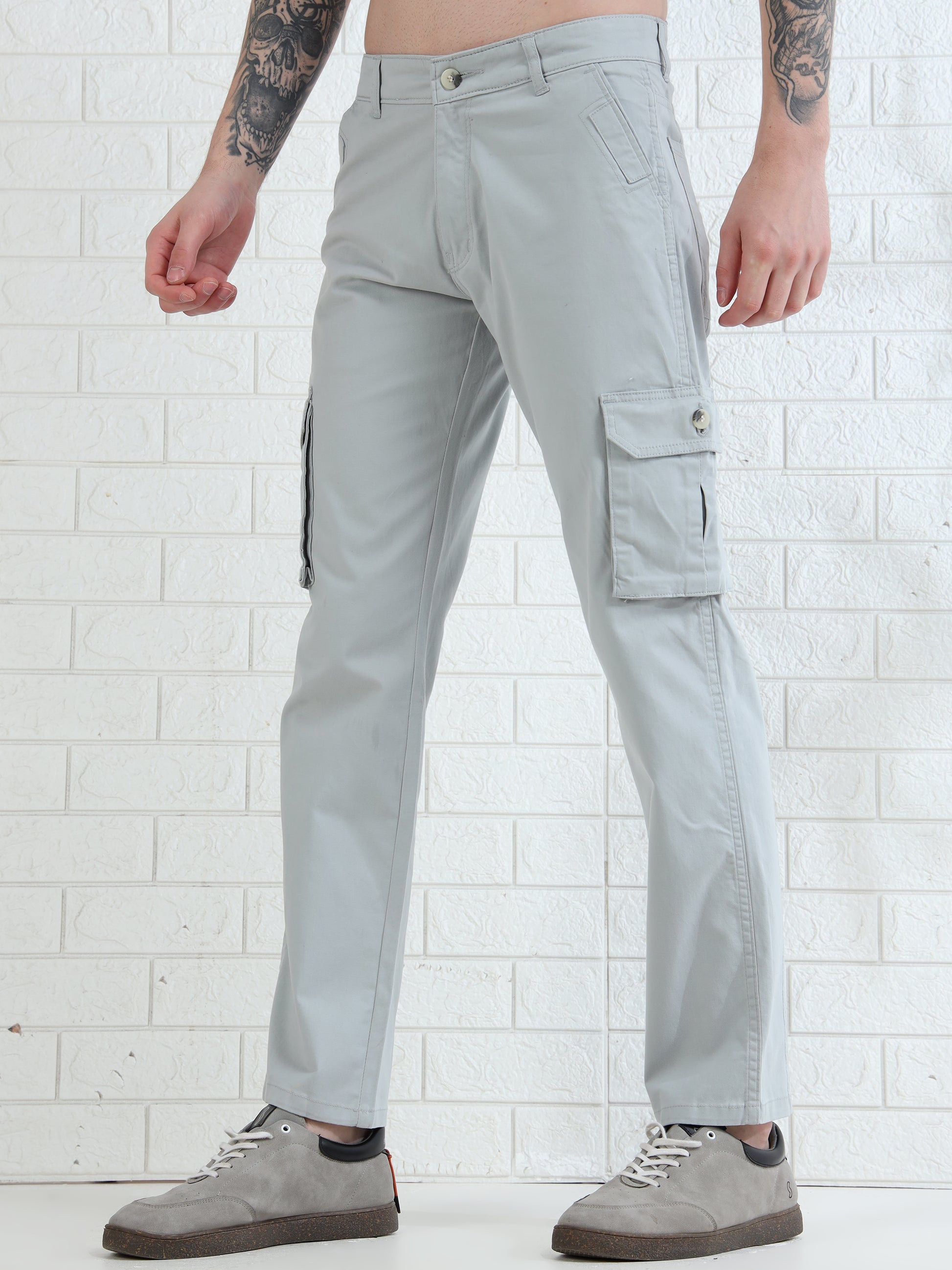 Stylish men's grey cargo trousers with utility flap pockets and modern look