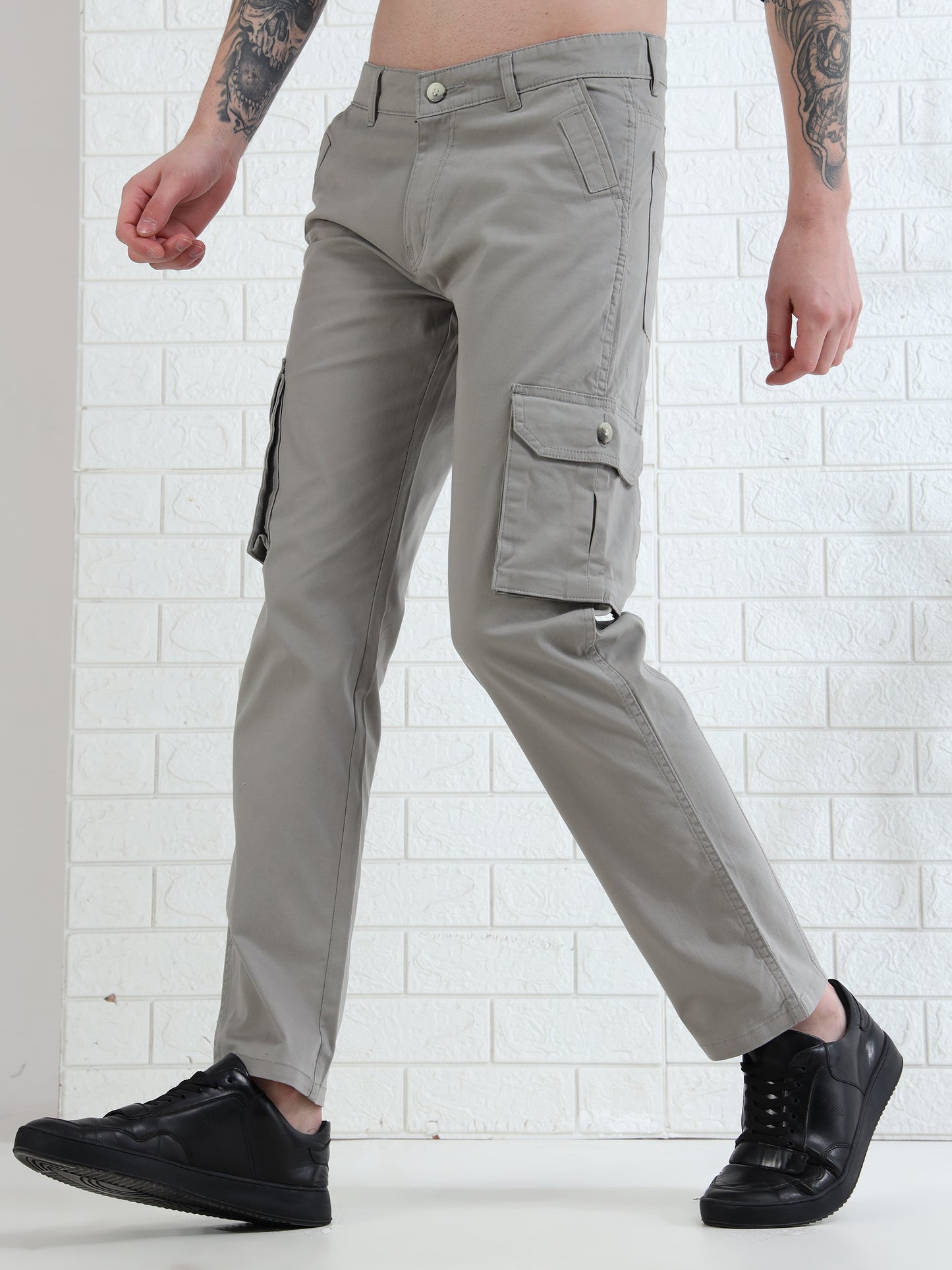 Stylish men's light khaki cargo trousers with utility pockets and modern look