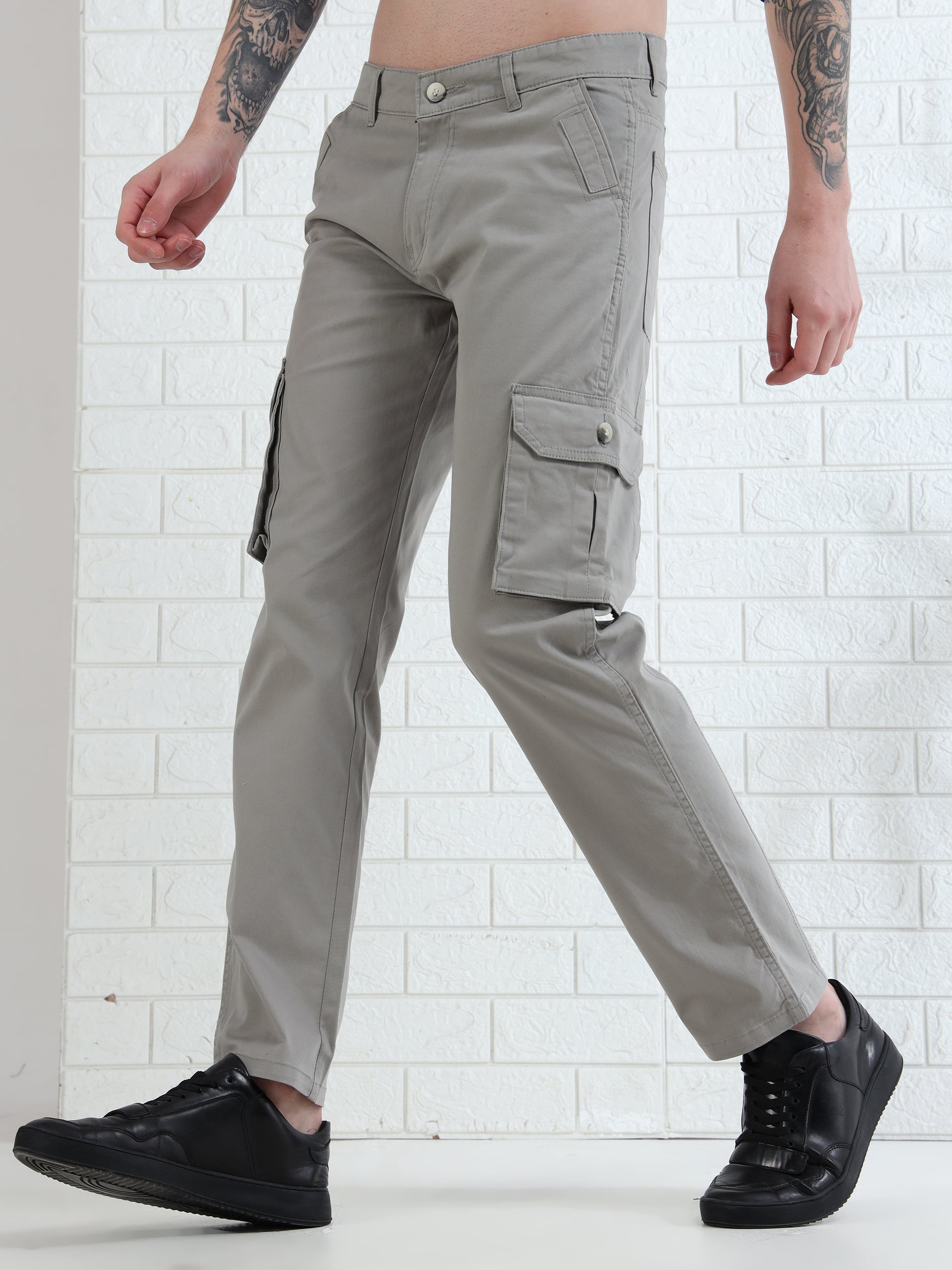 Stylish men's light khaki cargo trousers with utility pockets and modern look