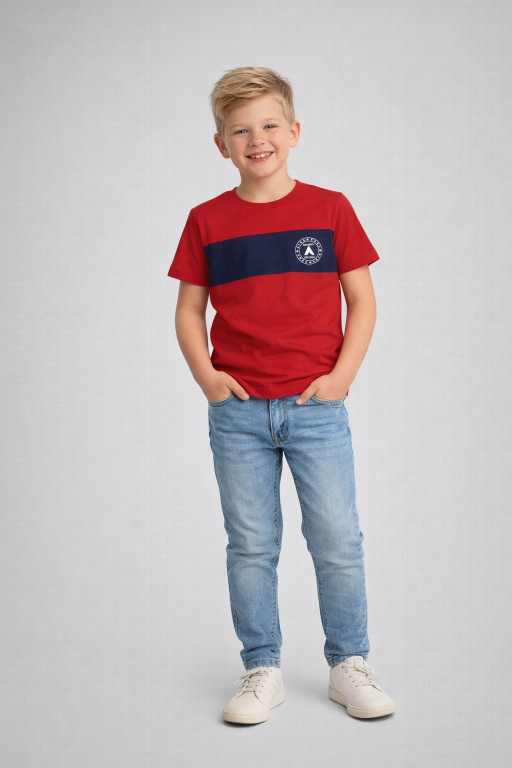 Boys red t-shirt with navy stripe paired with blue jeans