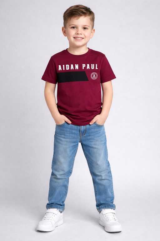 Boys maroon graphic t-shirt paired with blue jeans full body front pose trendy kids fashion wear.