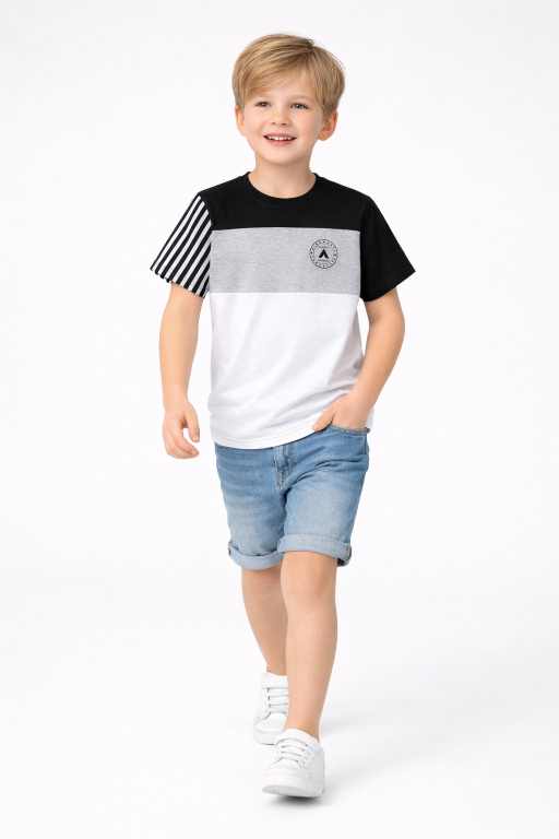 Boys black grey white colorblock half sleeve t-shirt walking pose with denim shorts trendy kids casual summer fashion wear.