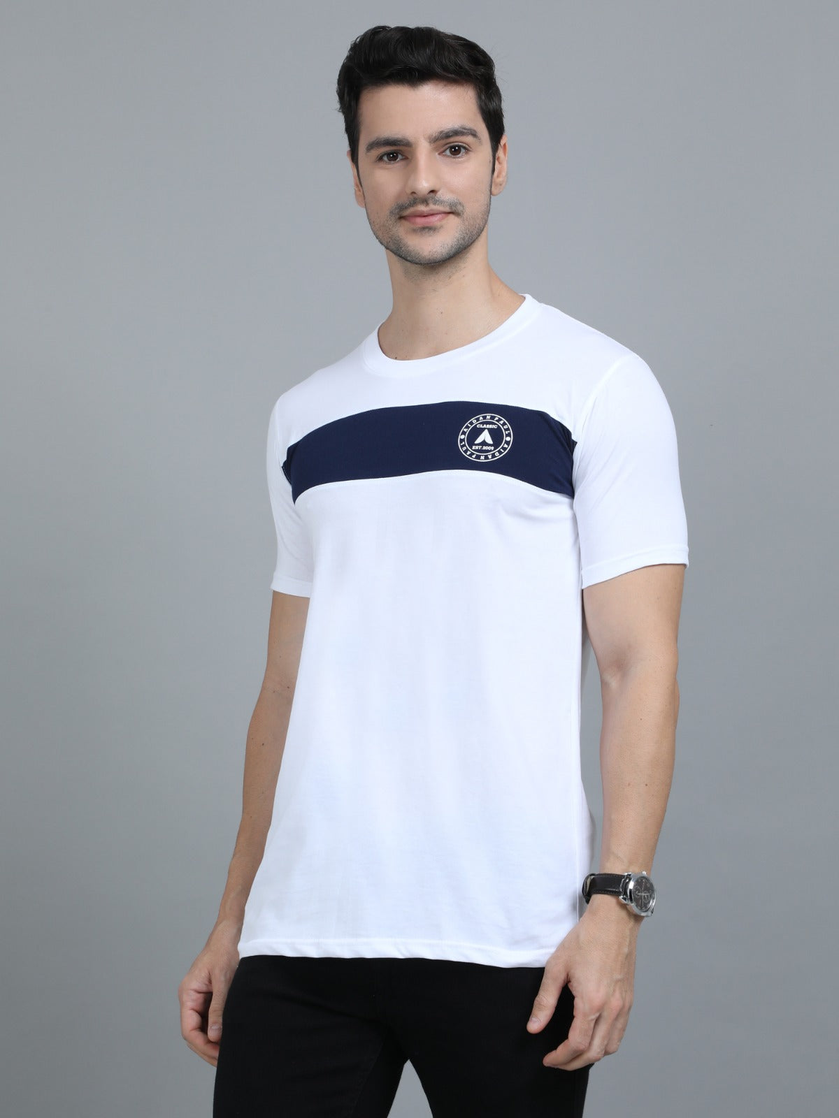 Fashionable men's white navy striped t-shirt front pose for summer casual streetwear look