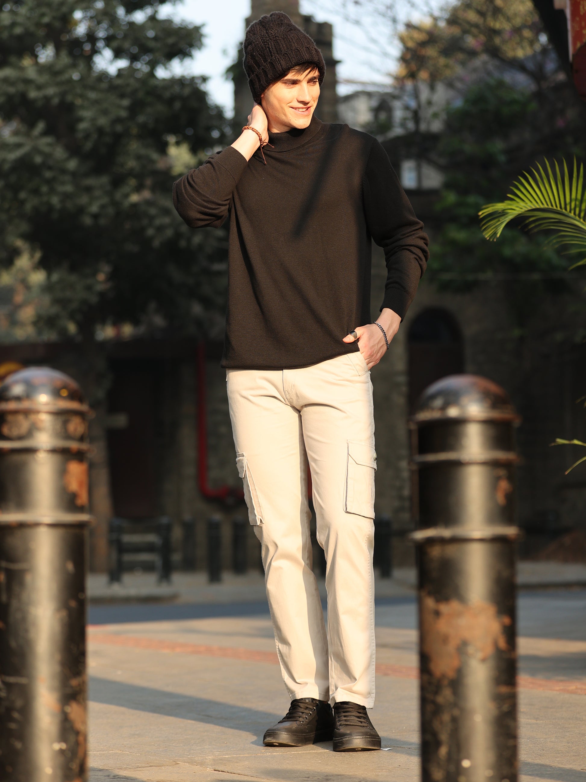 Mens cream cotton cargo pants with side flap pockets and straight fit