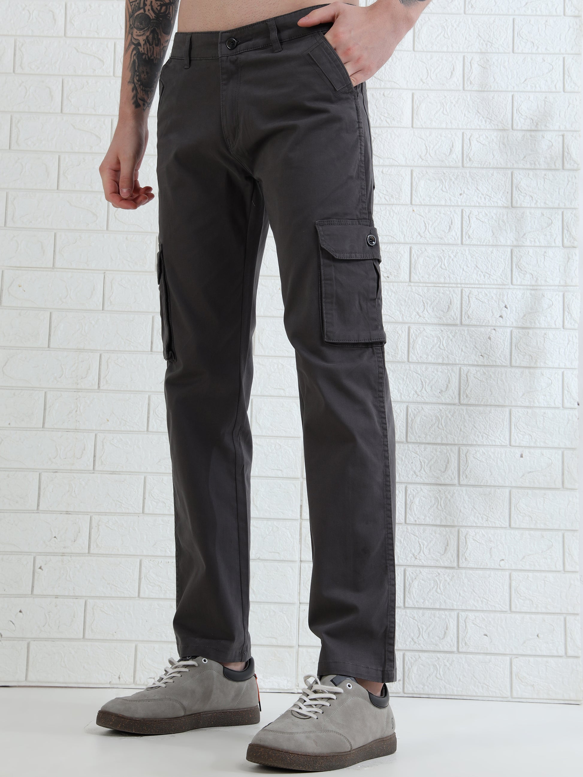 Stylish men's dark grey cargo trousers with utility pockets and modern look
