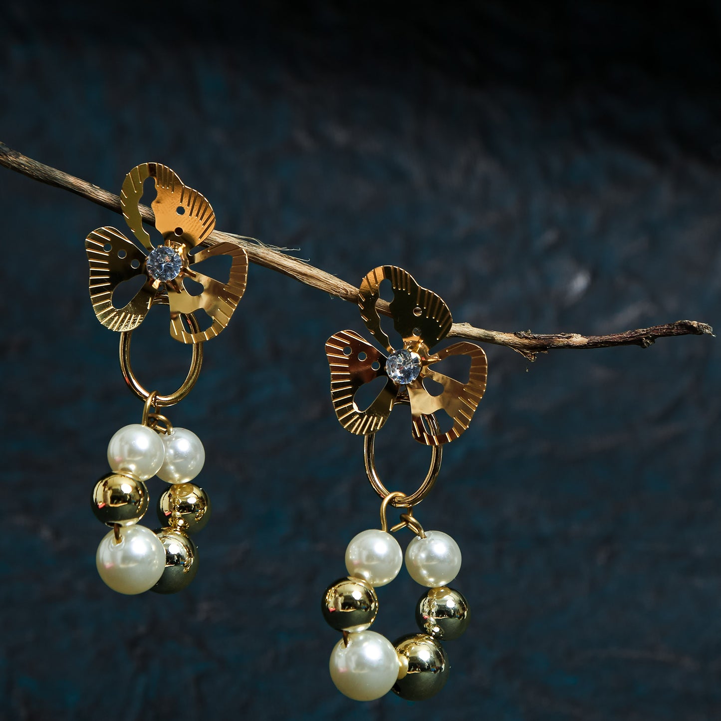 Gold floral pearl drop earrings with crystal flower studs and pearl-gold bead hoops