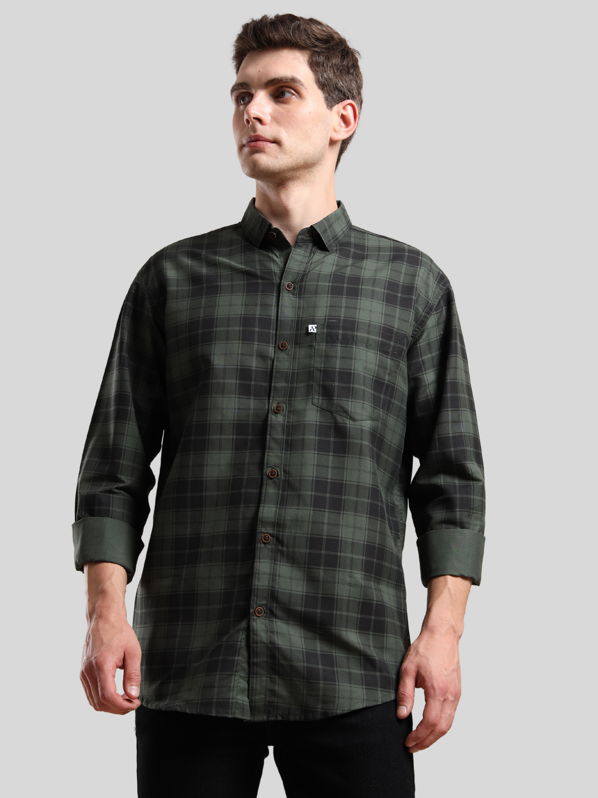 Classic fit green checked shirt for men with button-down design and rolled-up sleeves.