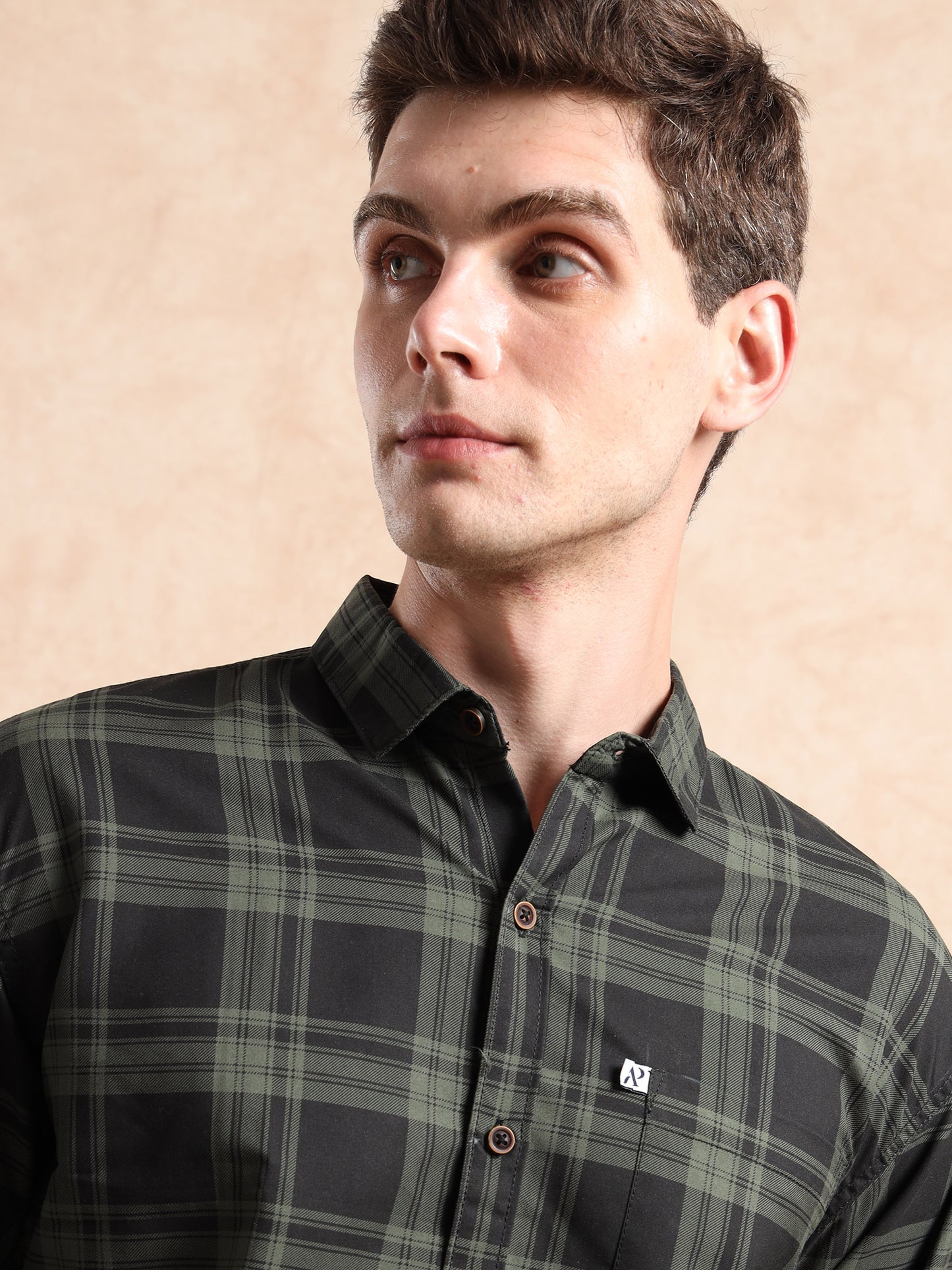 men, check shirt showing front buttons and pocket logo detail