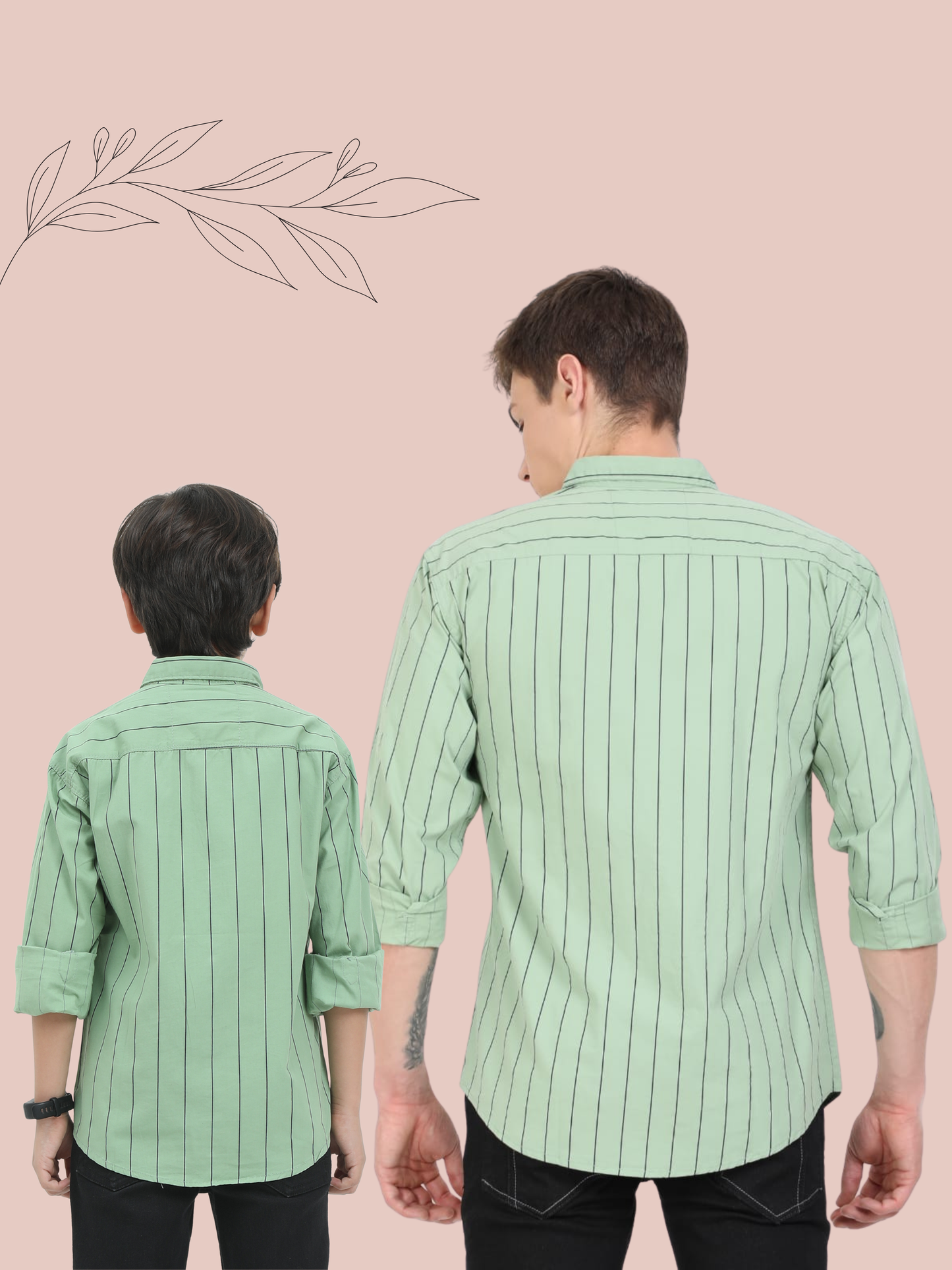 Two people wearing green striped shirts against a pink background