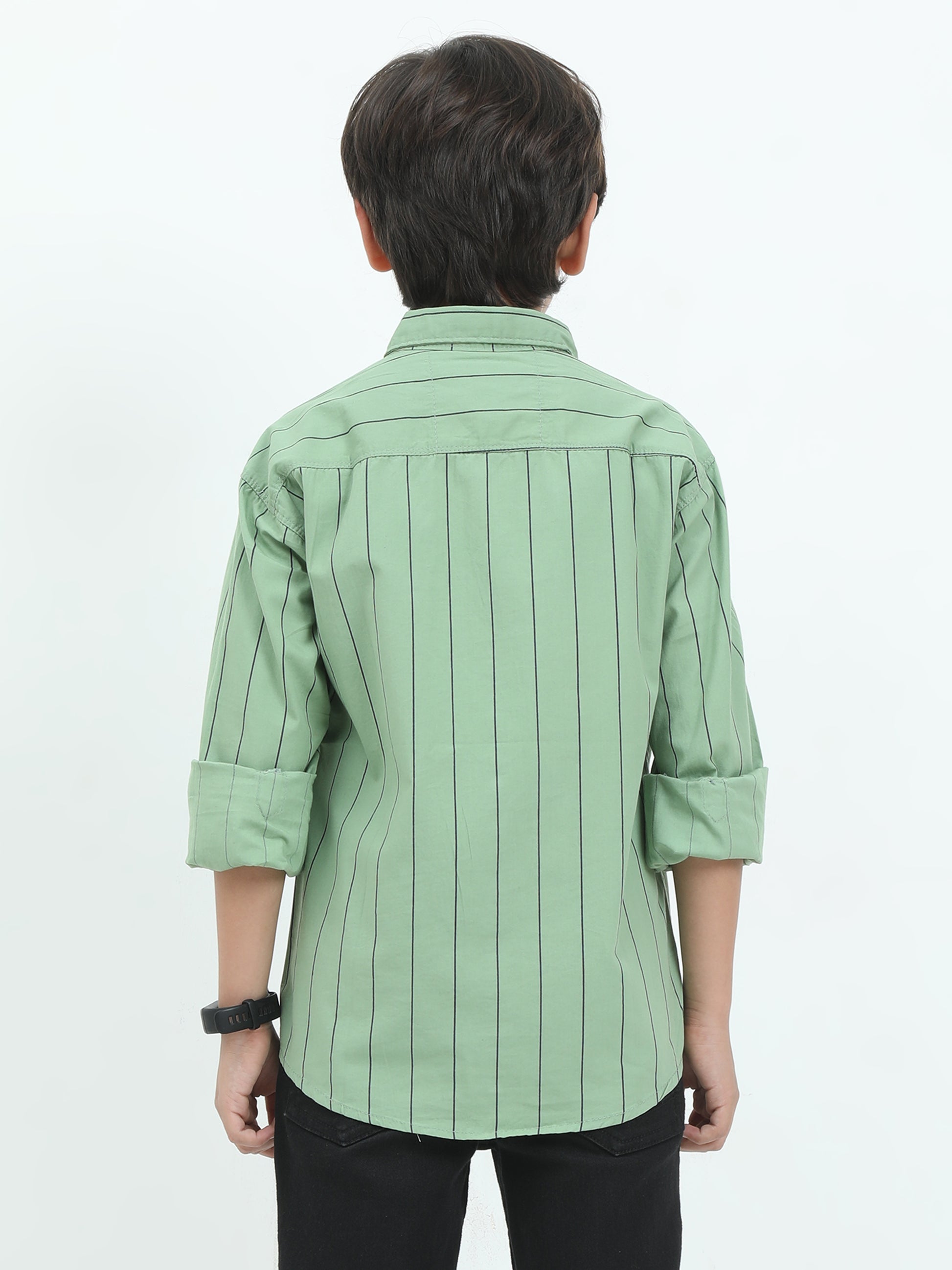 Person wearing a light green striped shirt on a white background