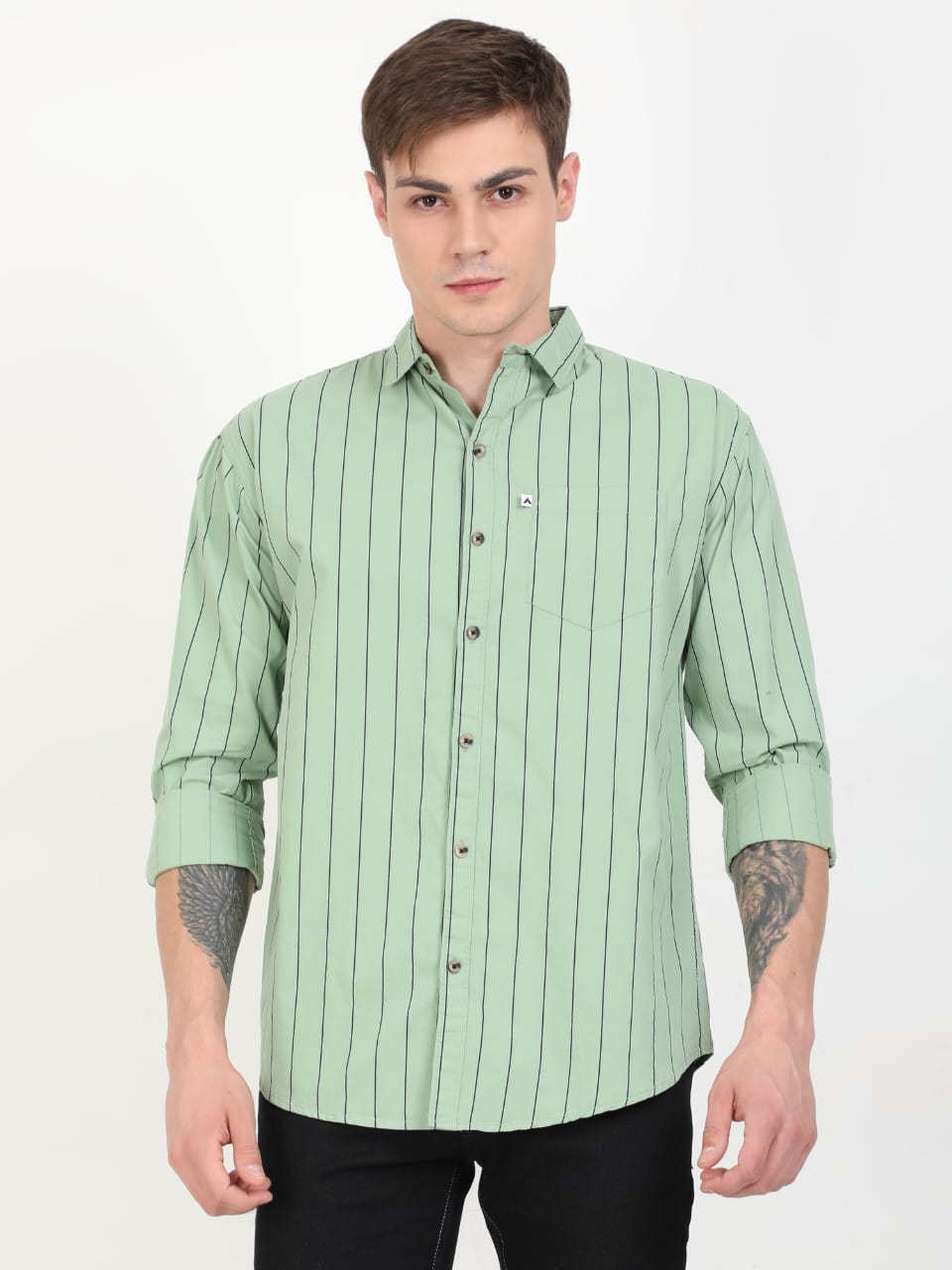 Man wearing a green striped shirt on a white background