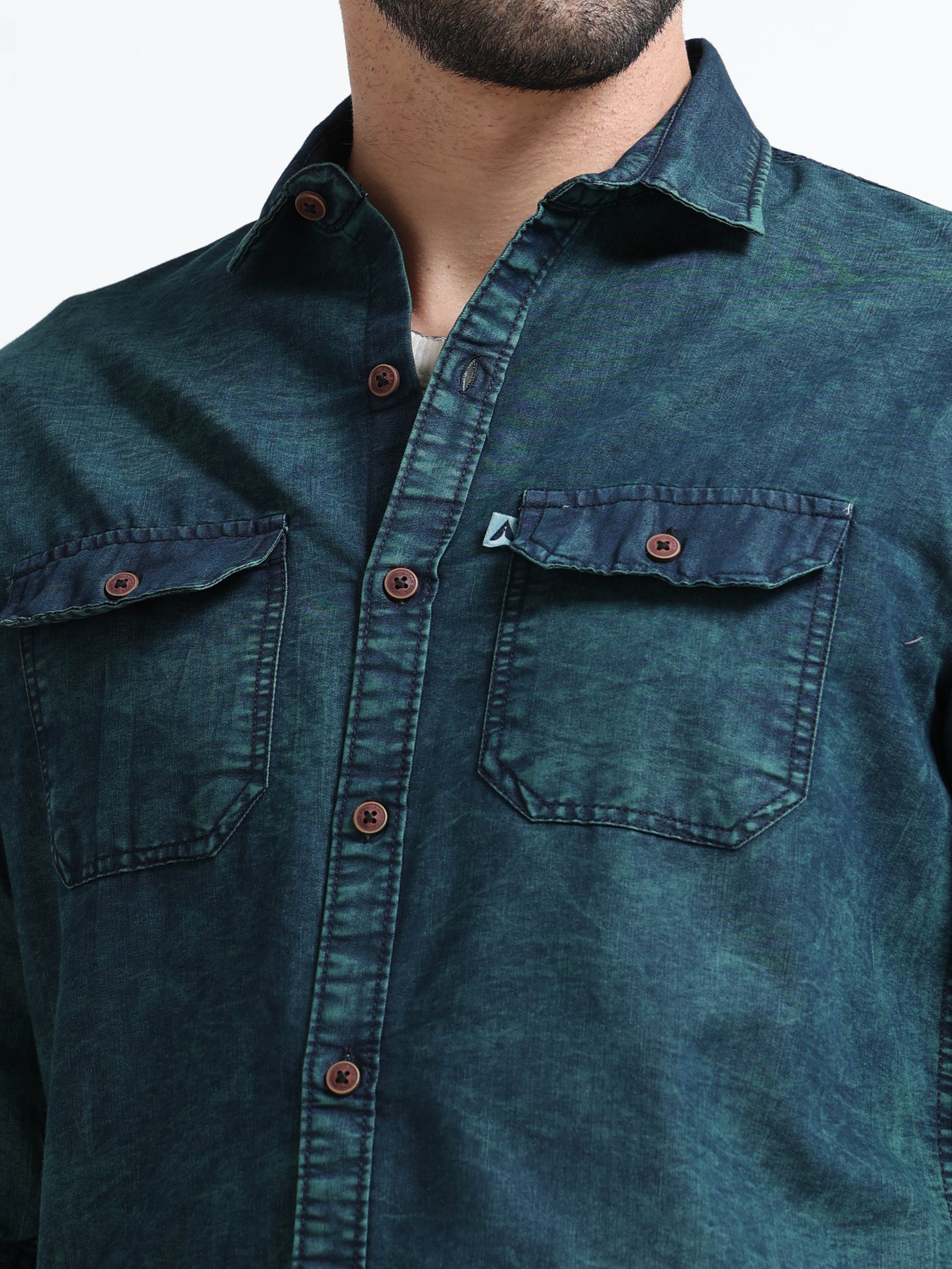 Mens dark green acid wash denim with full sleeves rolled up, stylish casual men's overshirt with curved hem.