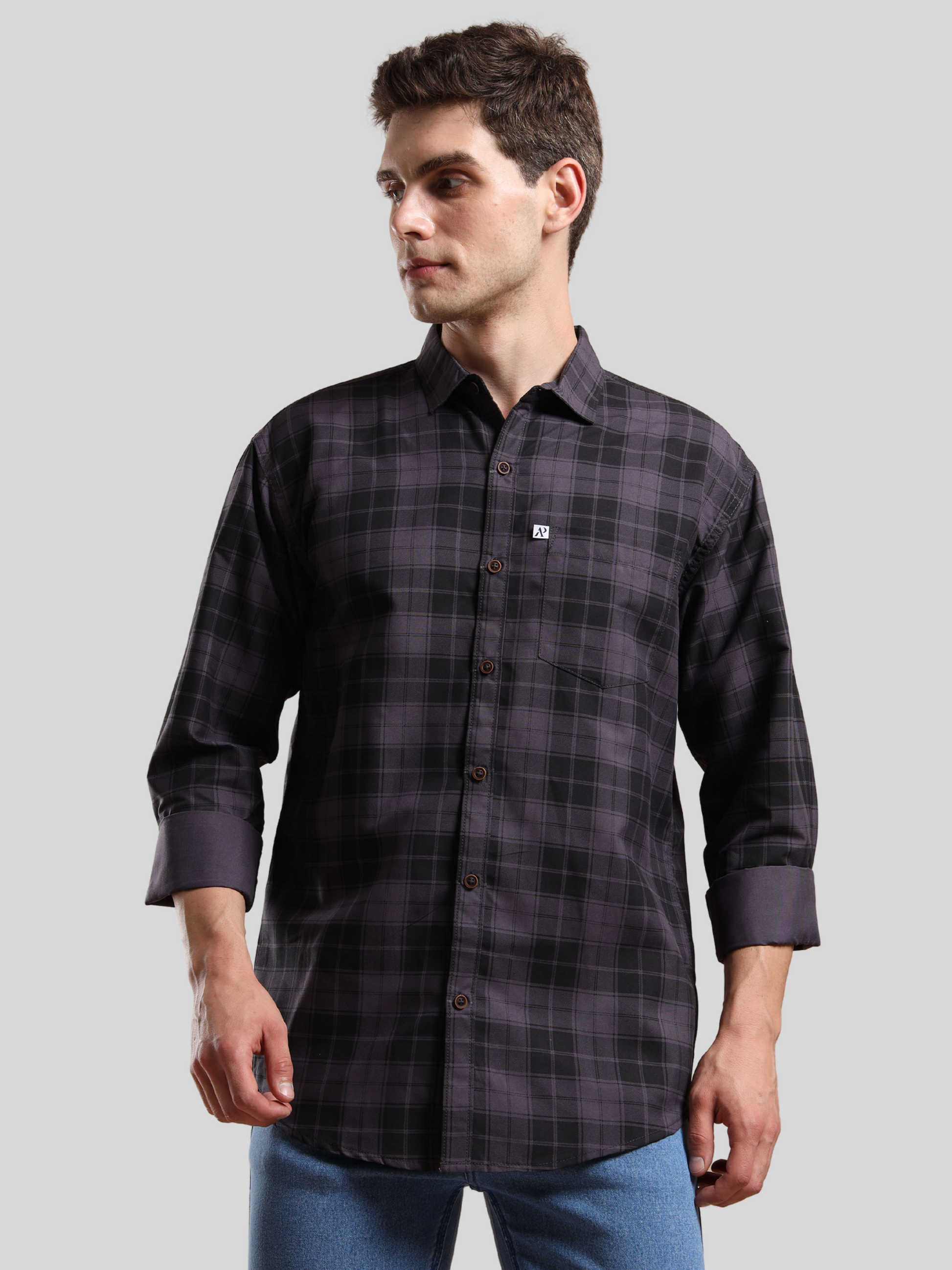 Stylish black checkered shirt for men paired with denim jeans