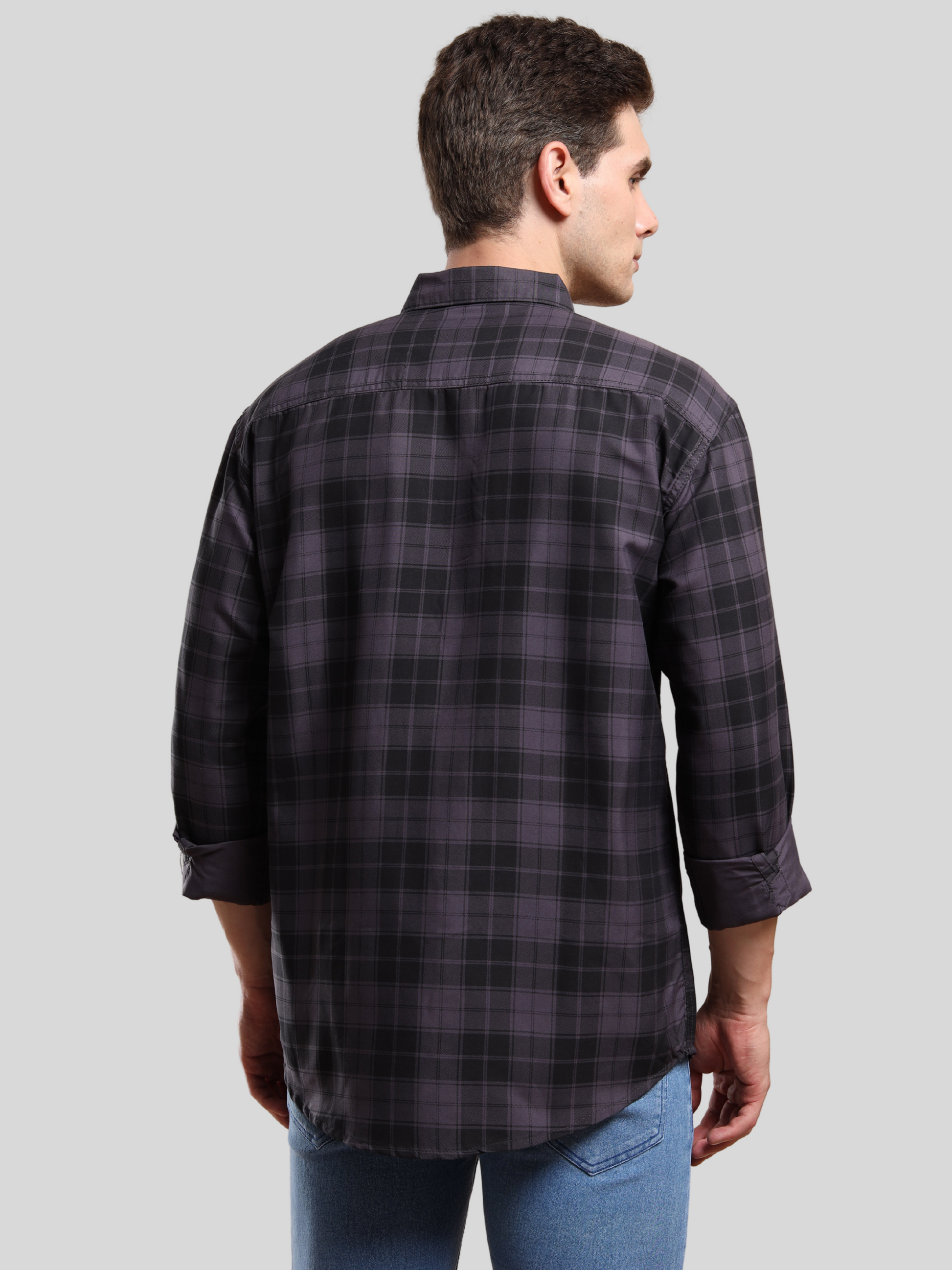 Stylish black checkered shirt for men paired with denim jeans
