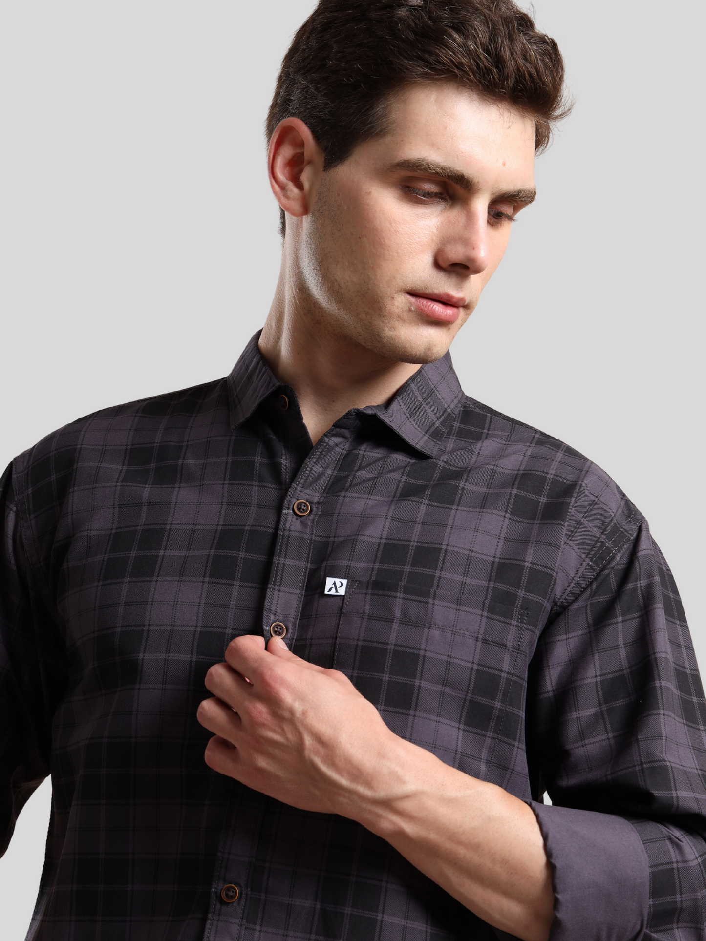 checkered shirt with front pocket and button details