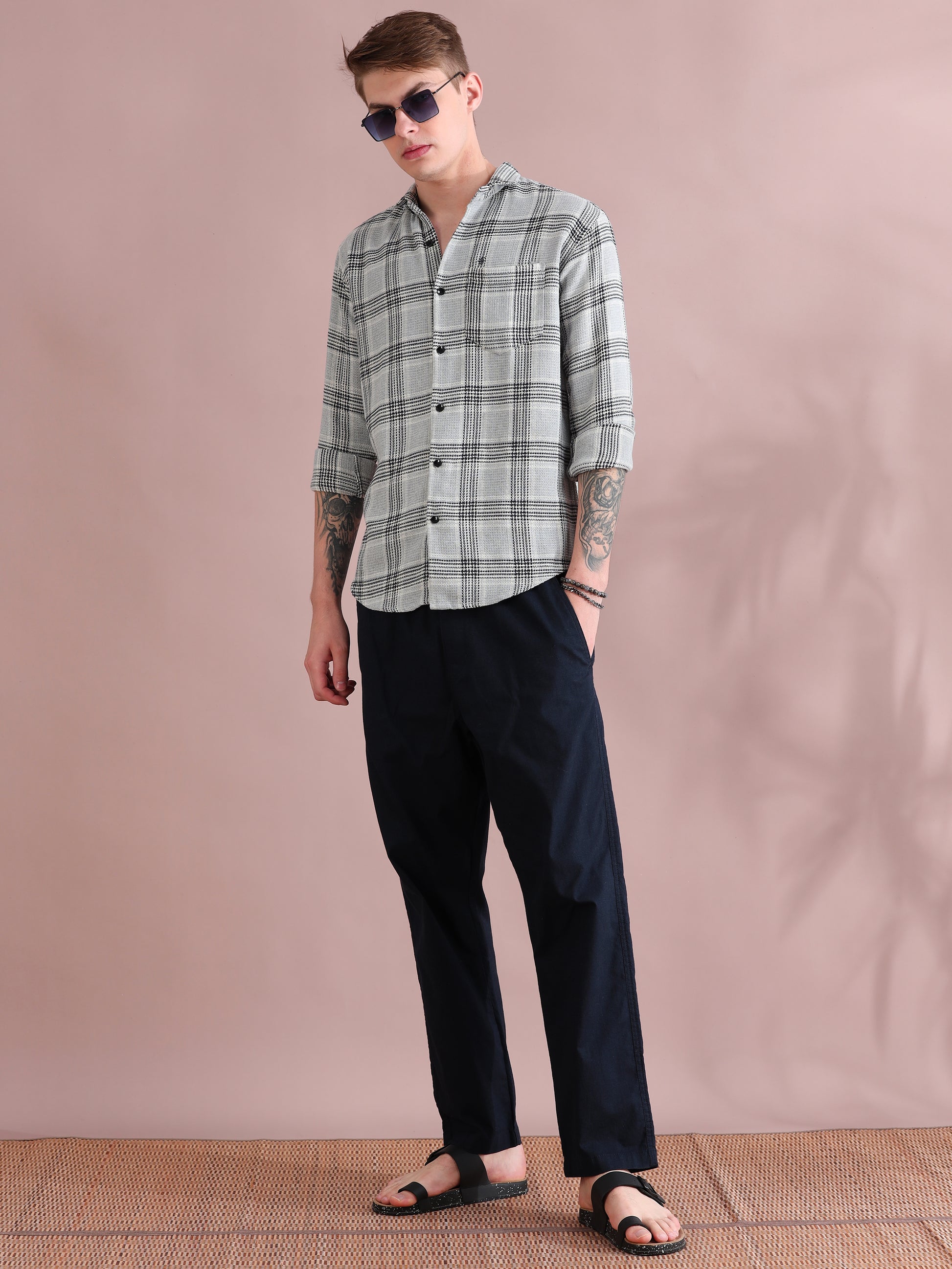 Fashionable men's check pattern shirt with minimal design and smart styling