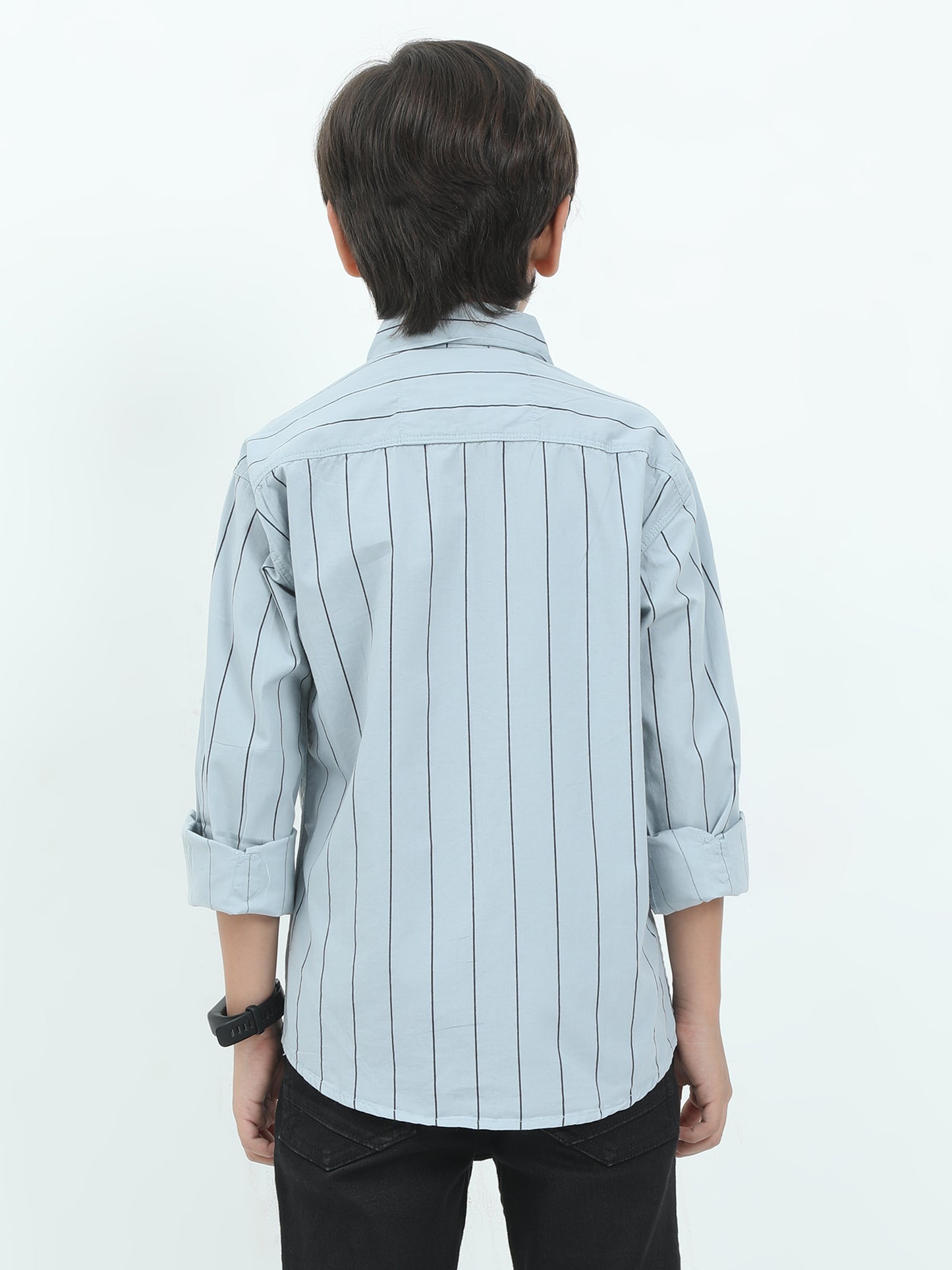 Person wearing a light blue striped shirt on a white background