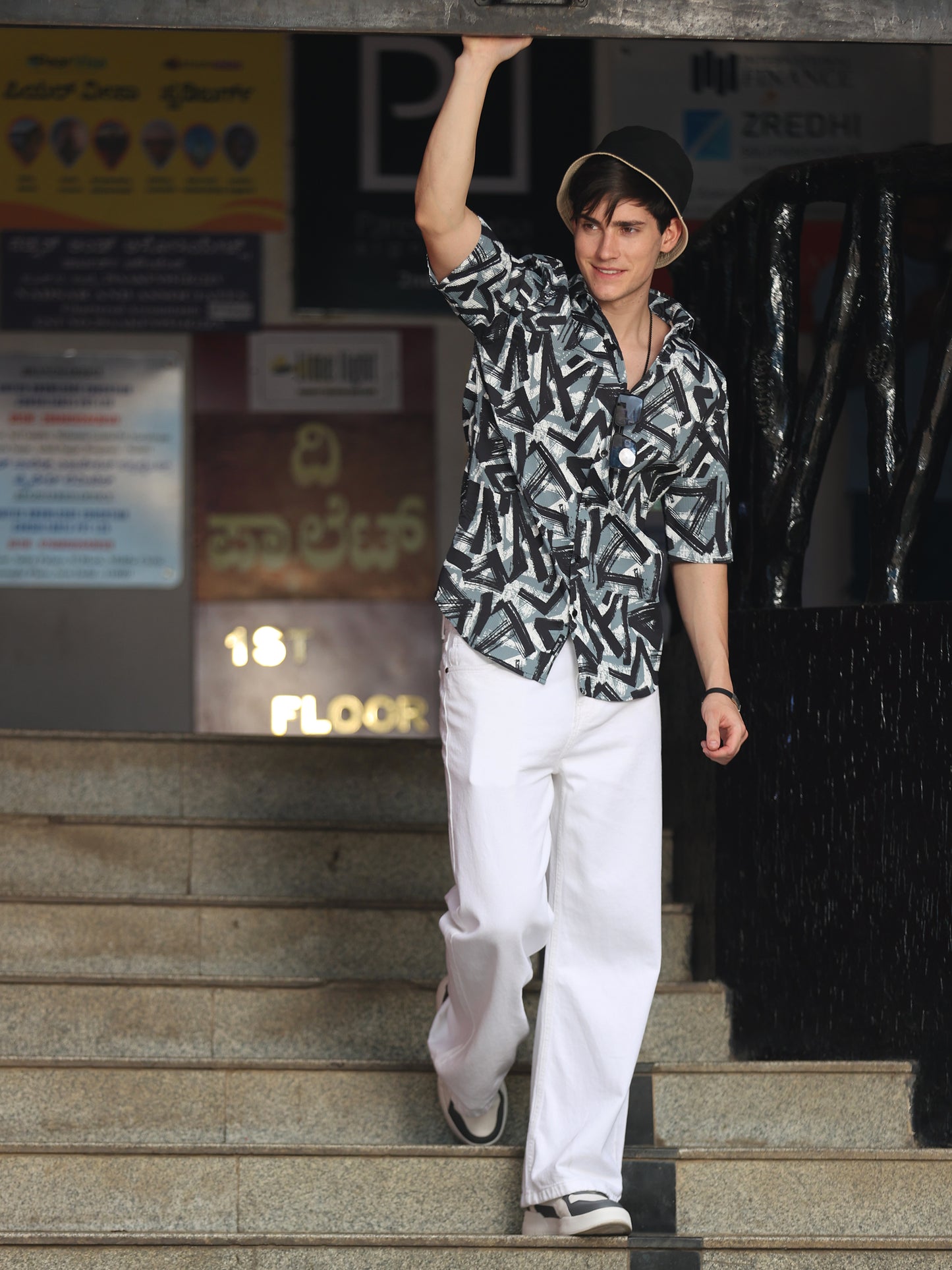 Fashionable men's graphic print shirt with contemporary streetwear style