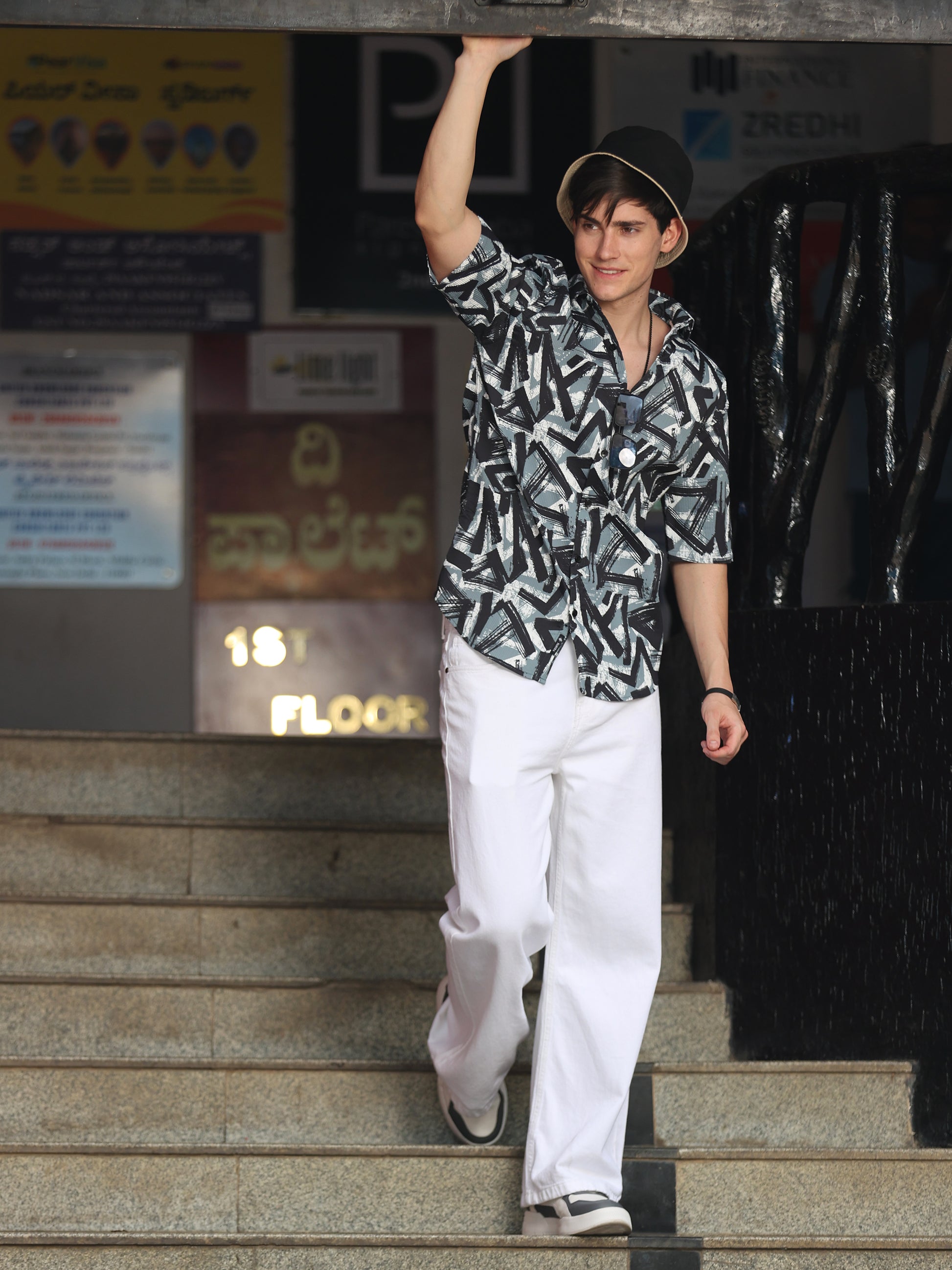 Fashionable men's graphic print shirt with contemporary streetwear style