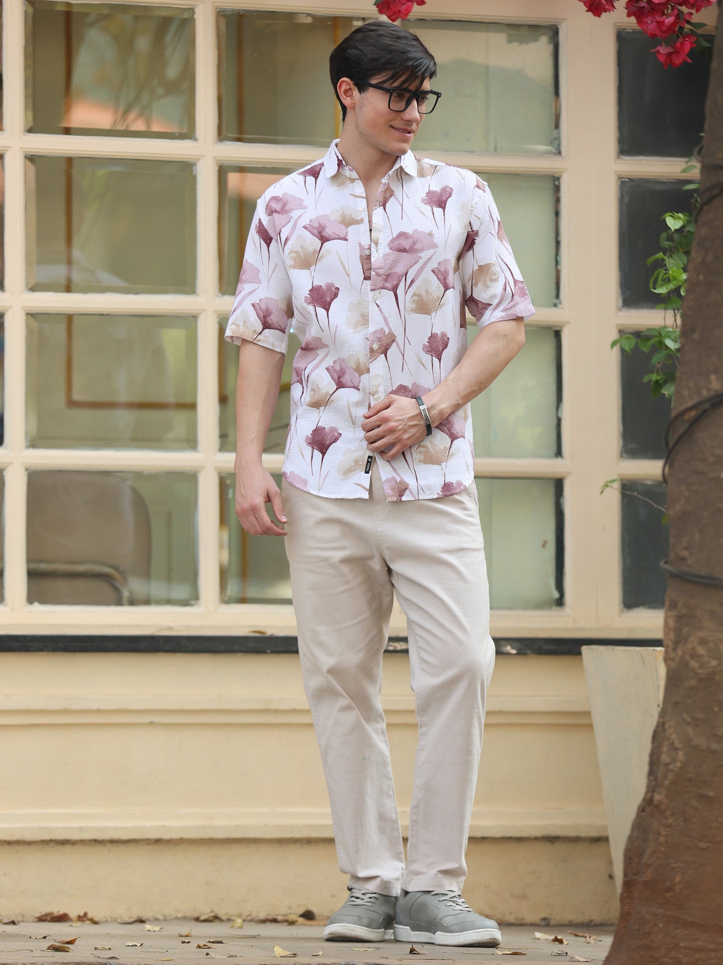 Trendy men's floral shirt with pastel tones and button-down front