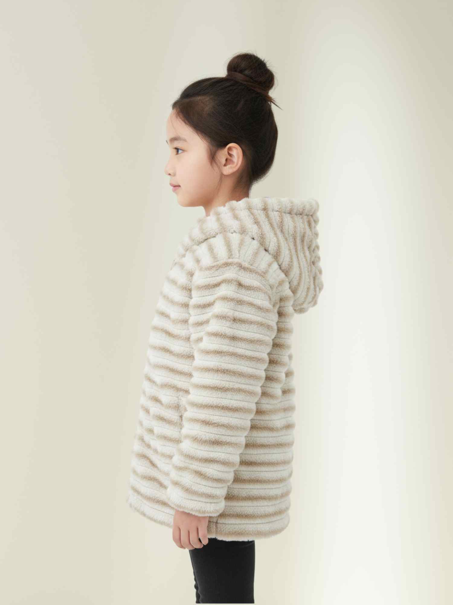 cream fur hooded winter jacket, soft plush material and cozy design for children.