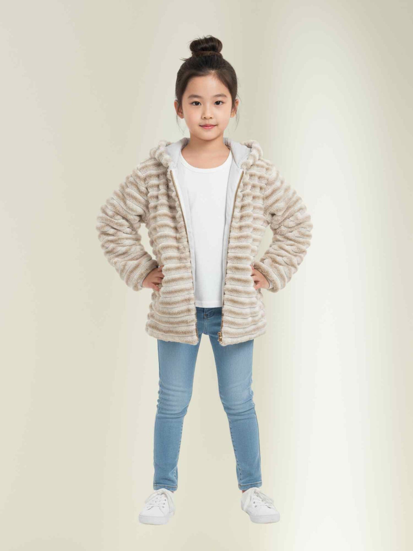 cream plush hooded jacket with open zipper, styled with blue jeans, kids winter fashion outfit.