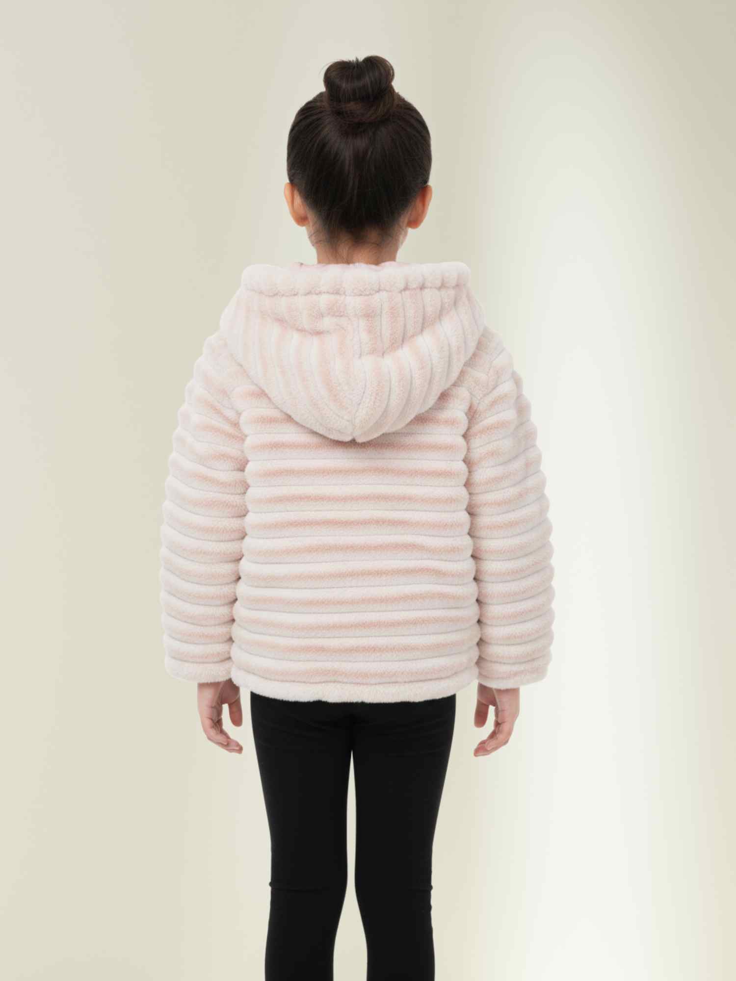 pink ribbed fur hooded jacket and black leggings