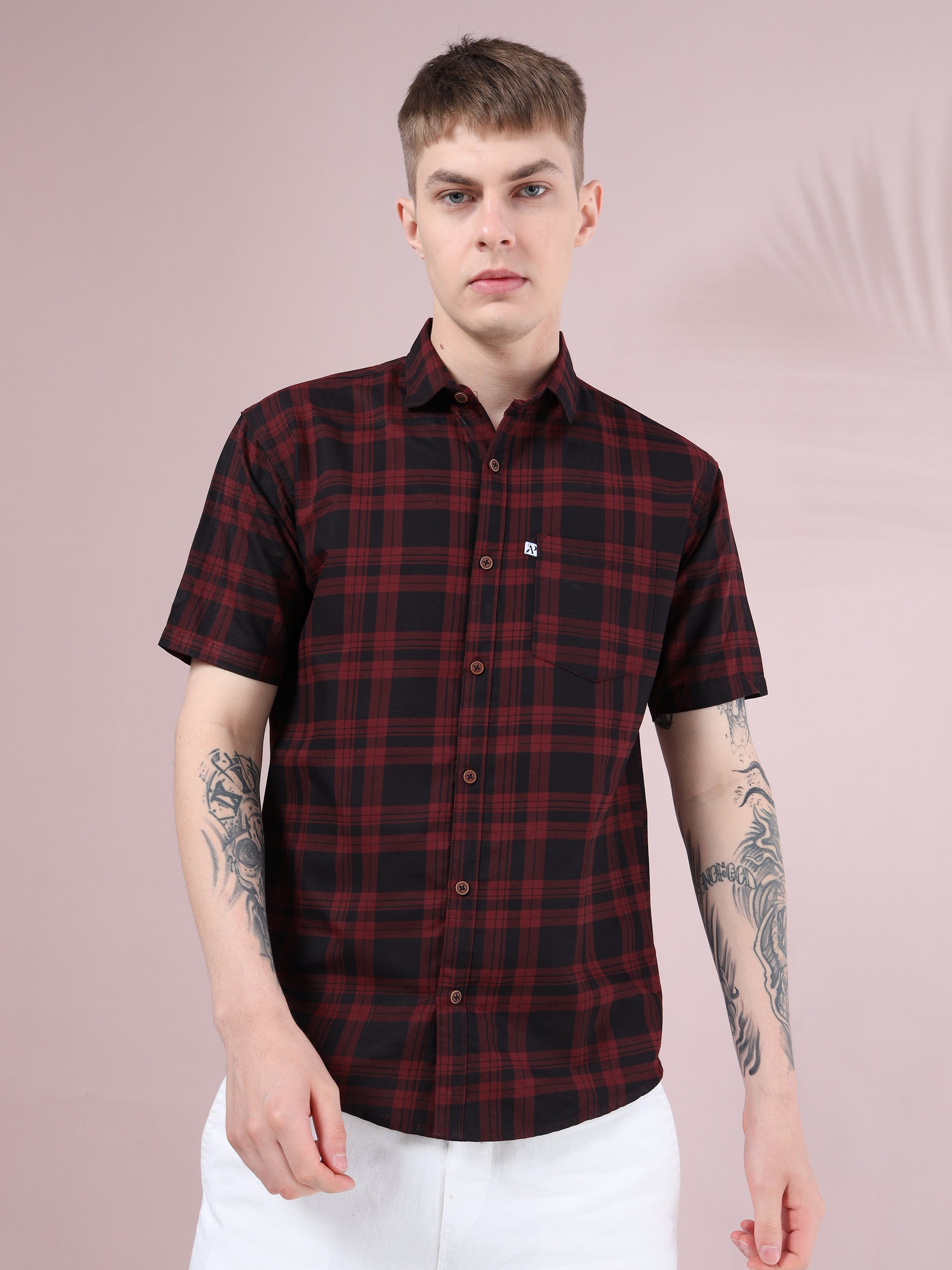men, maroon and black checkered slim fit short sleeve shirt paired with white pants