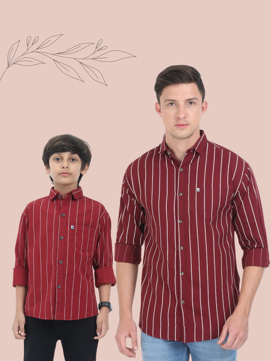 Two individuals wearing matching red striped shirts on a beige background