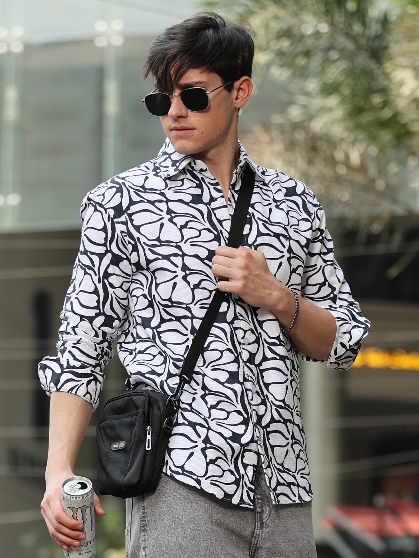 men's black and white patterned shirt with button-down front outdoor