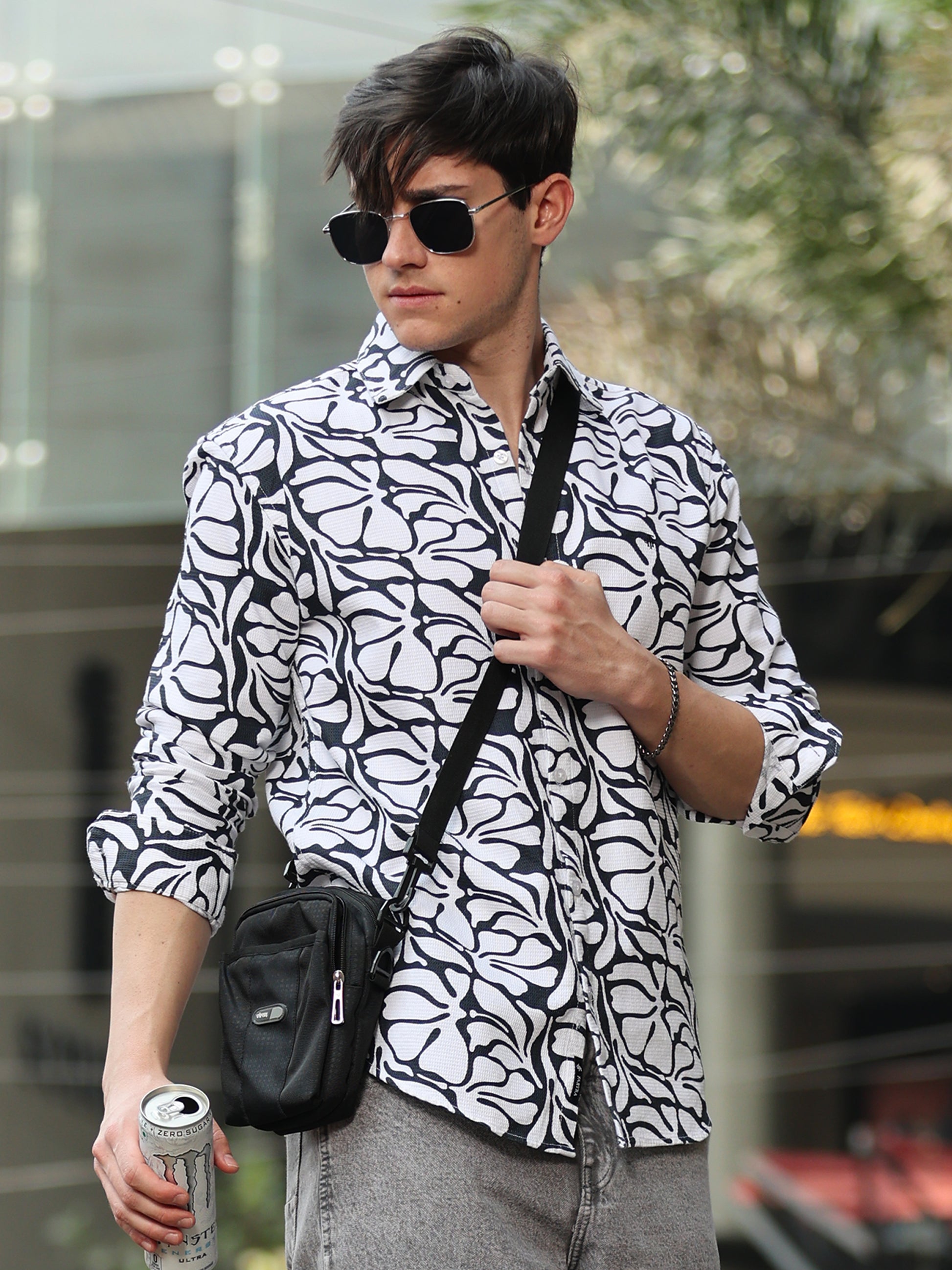 men's black and white patterned shirt with button-down front outdoor