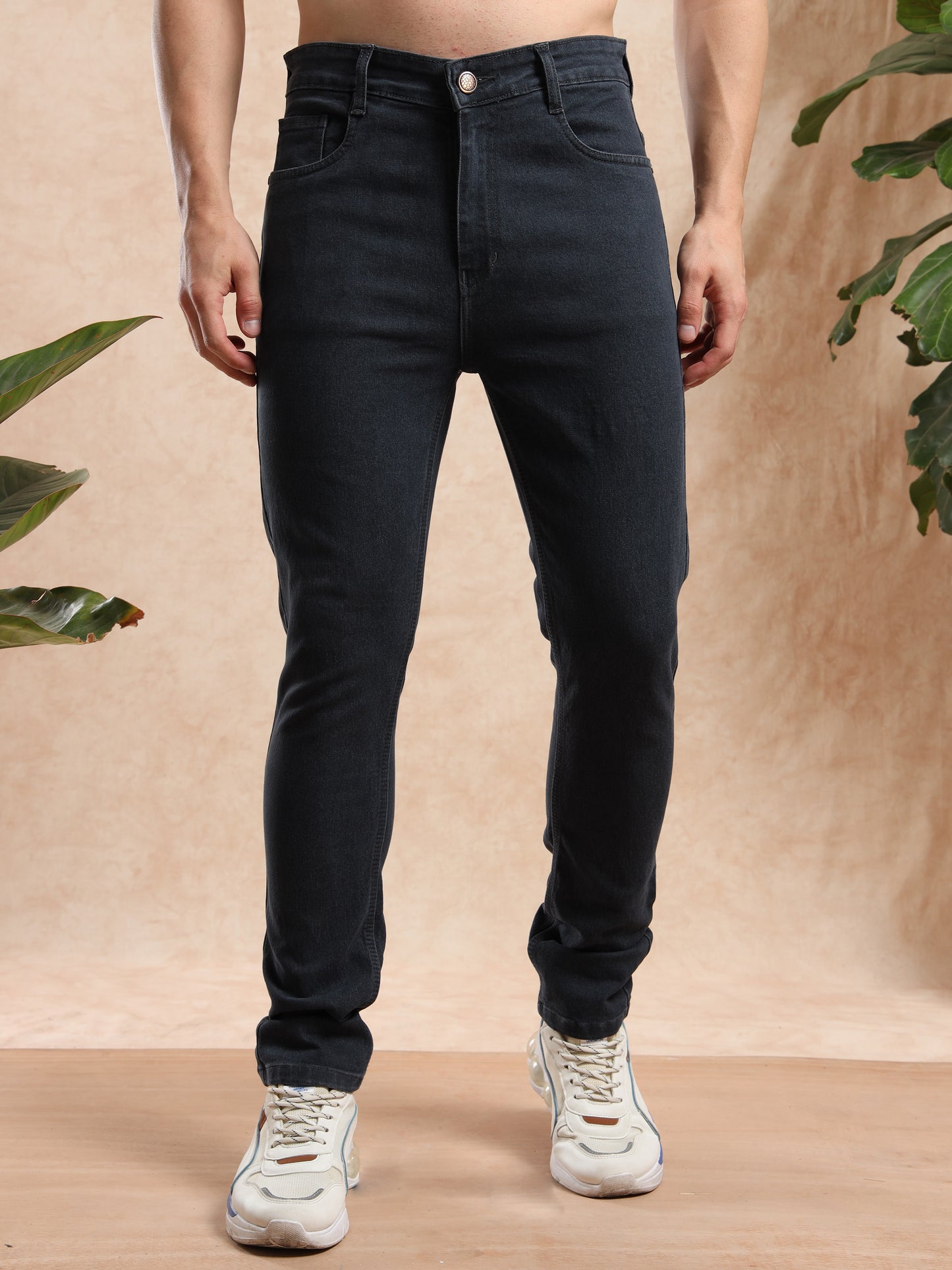 Black slim fit jeans for men with button closure, versatile casual and smart wear