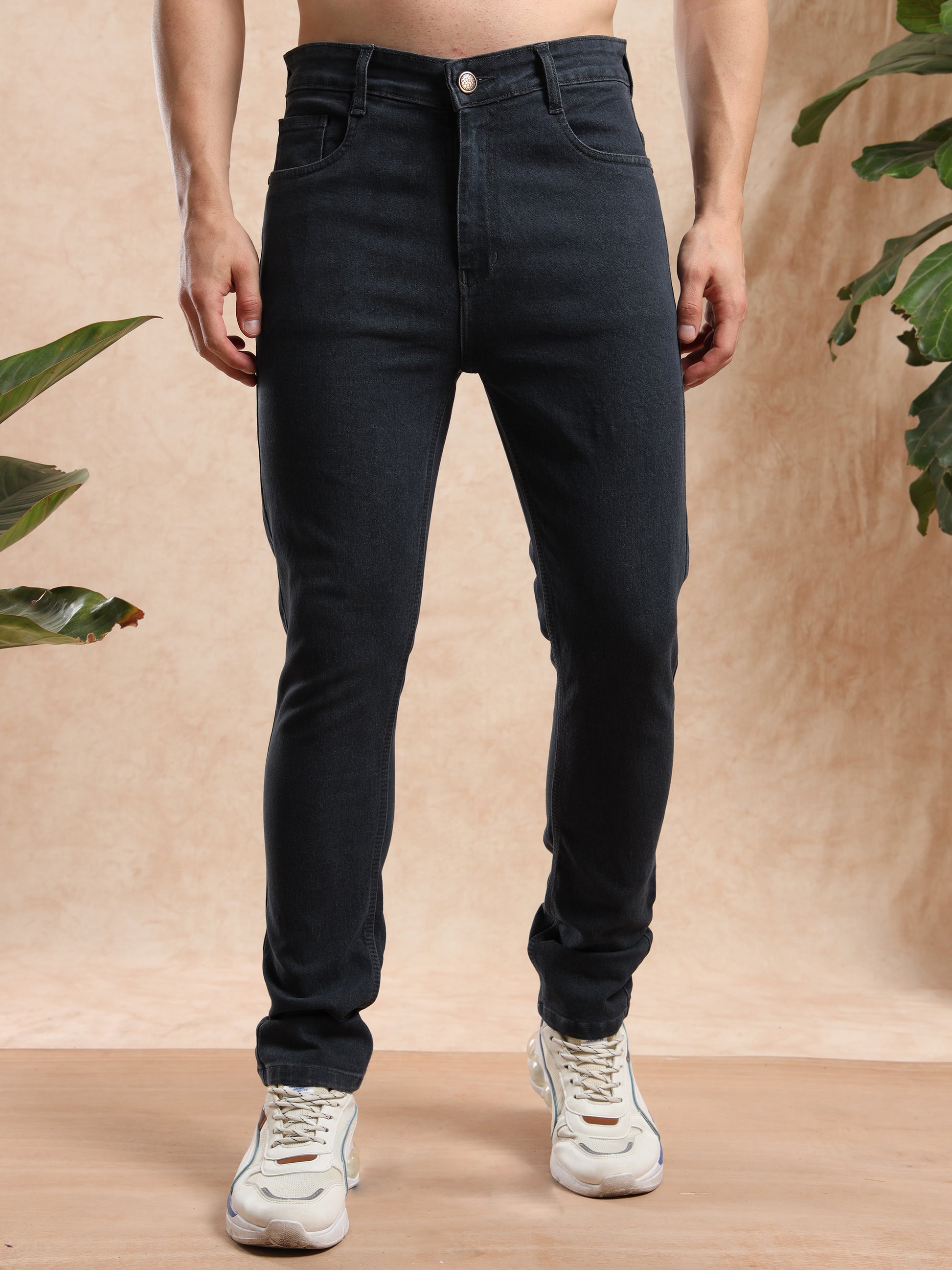 Black slim fit jeans for men with button closure, versatile casual and smart wear