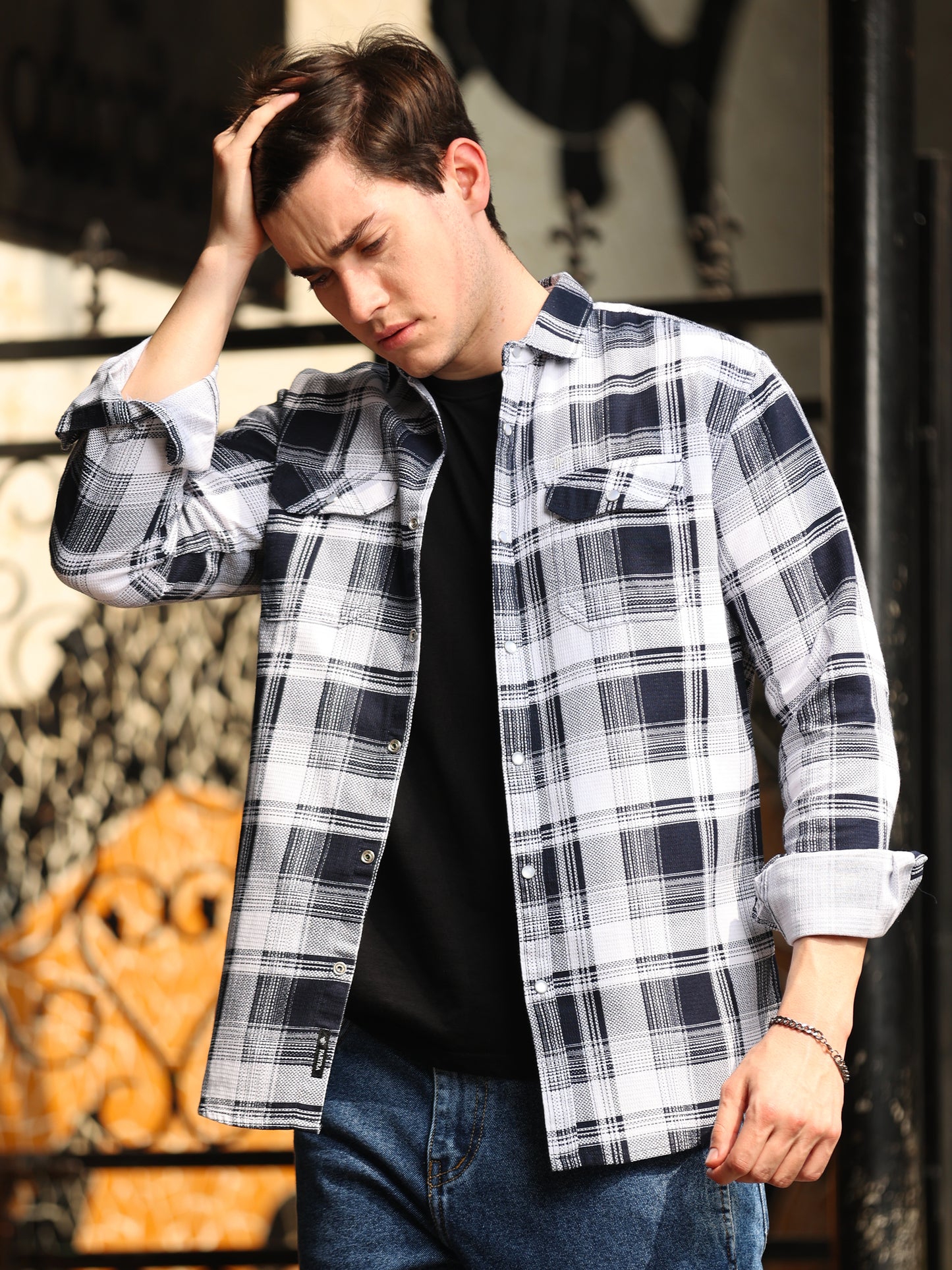 Men's black and white check shirt with full sleeves and layered casual look