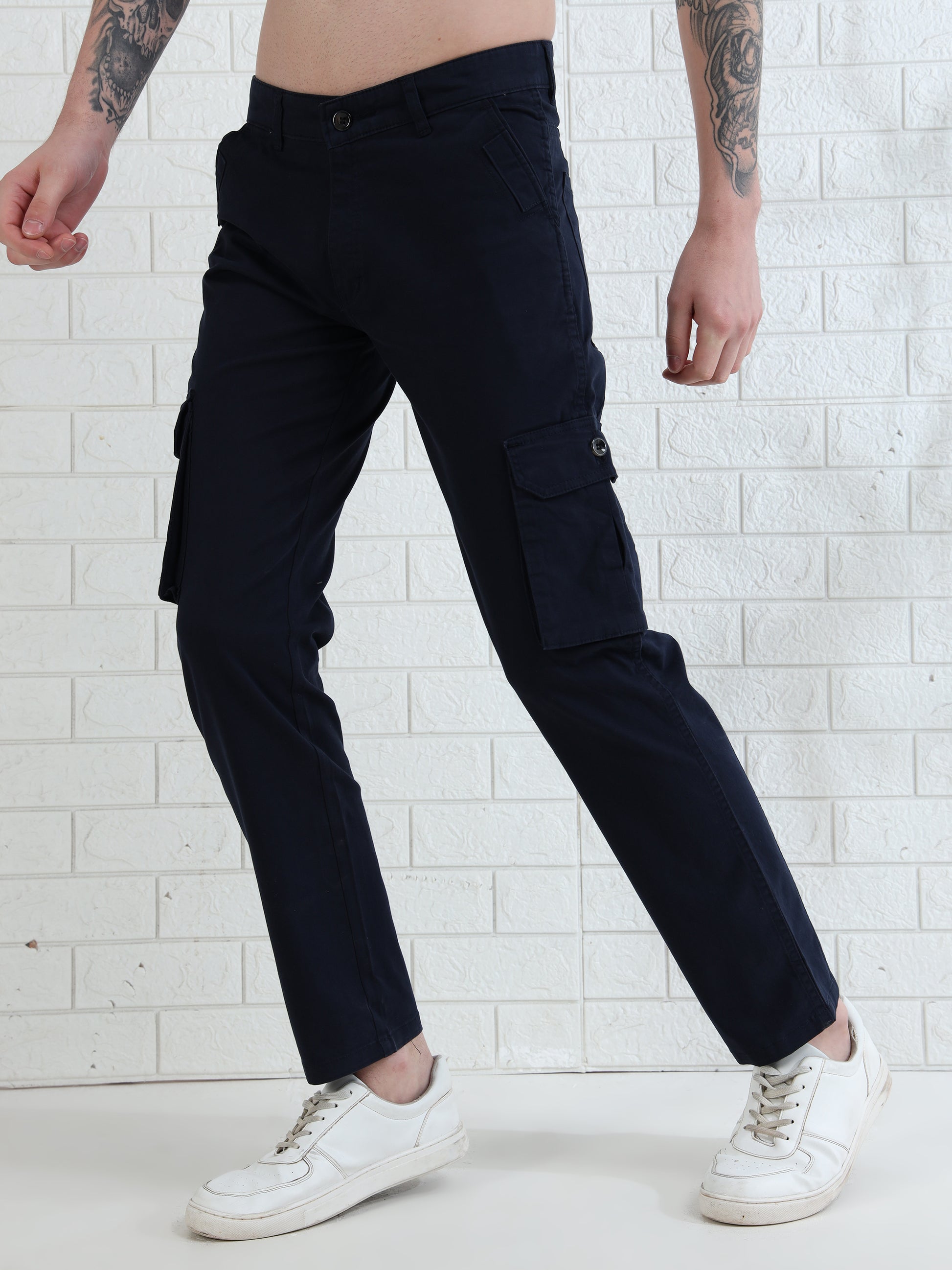 Stylish men's navy cargo trousers with utility pockets and modern design