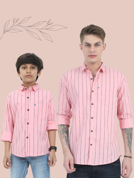 Two individuals wearing matching pink striped shirts on a beige background